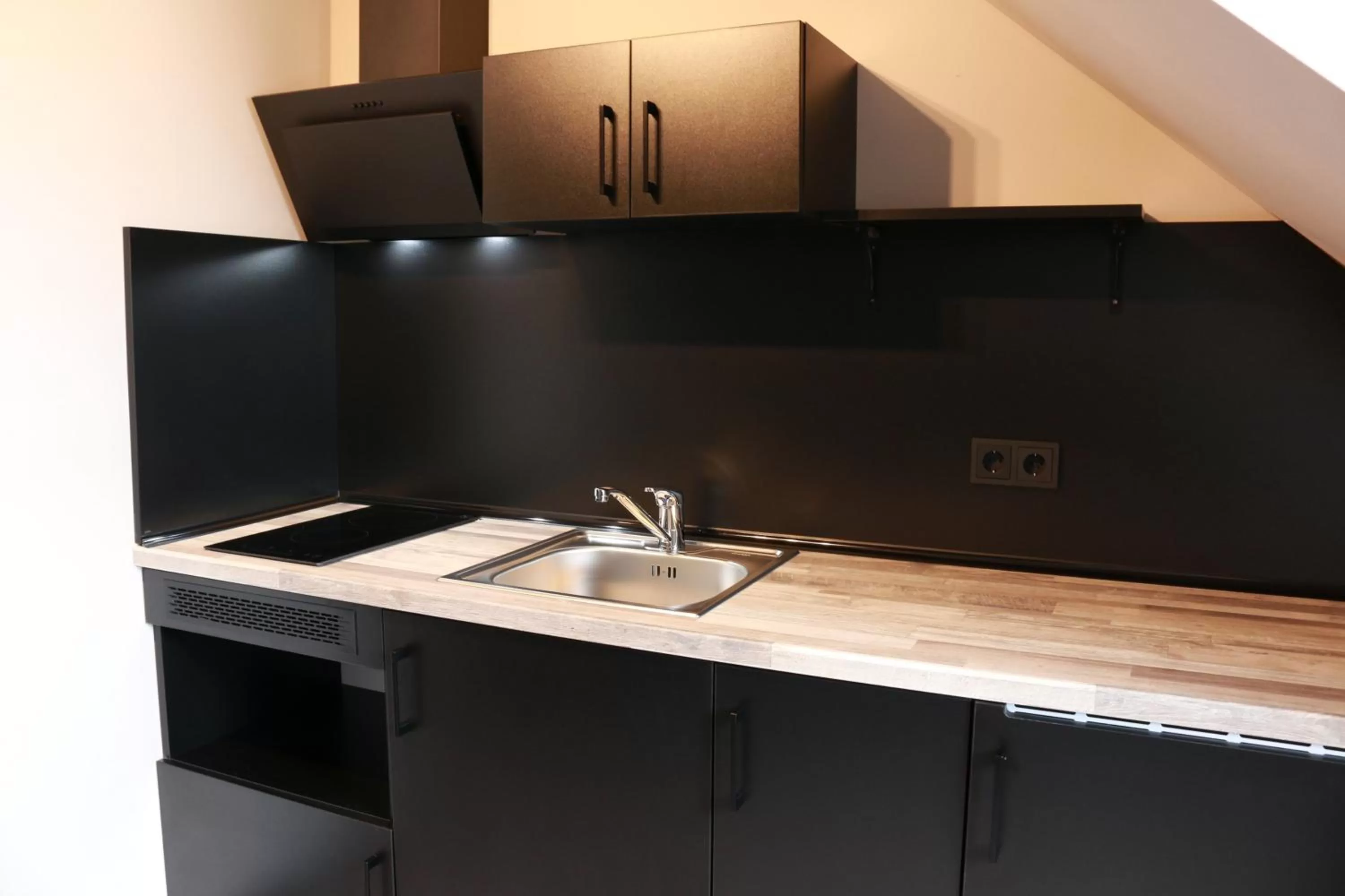 Kitchen or kitchenette in Urban Home Self Check-In Hotel