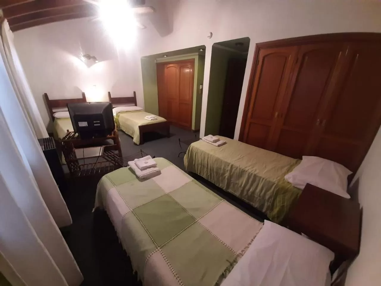 Photo of the whole room, TV/Entertainment Center in Caseros 44 B&B