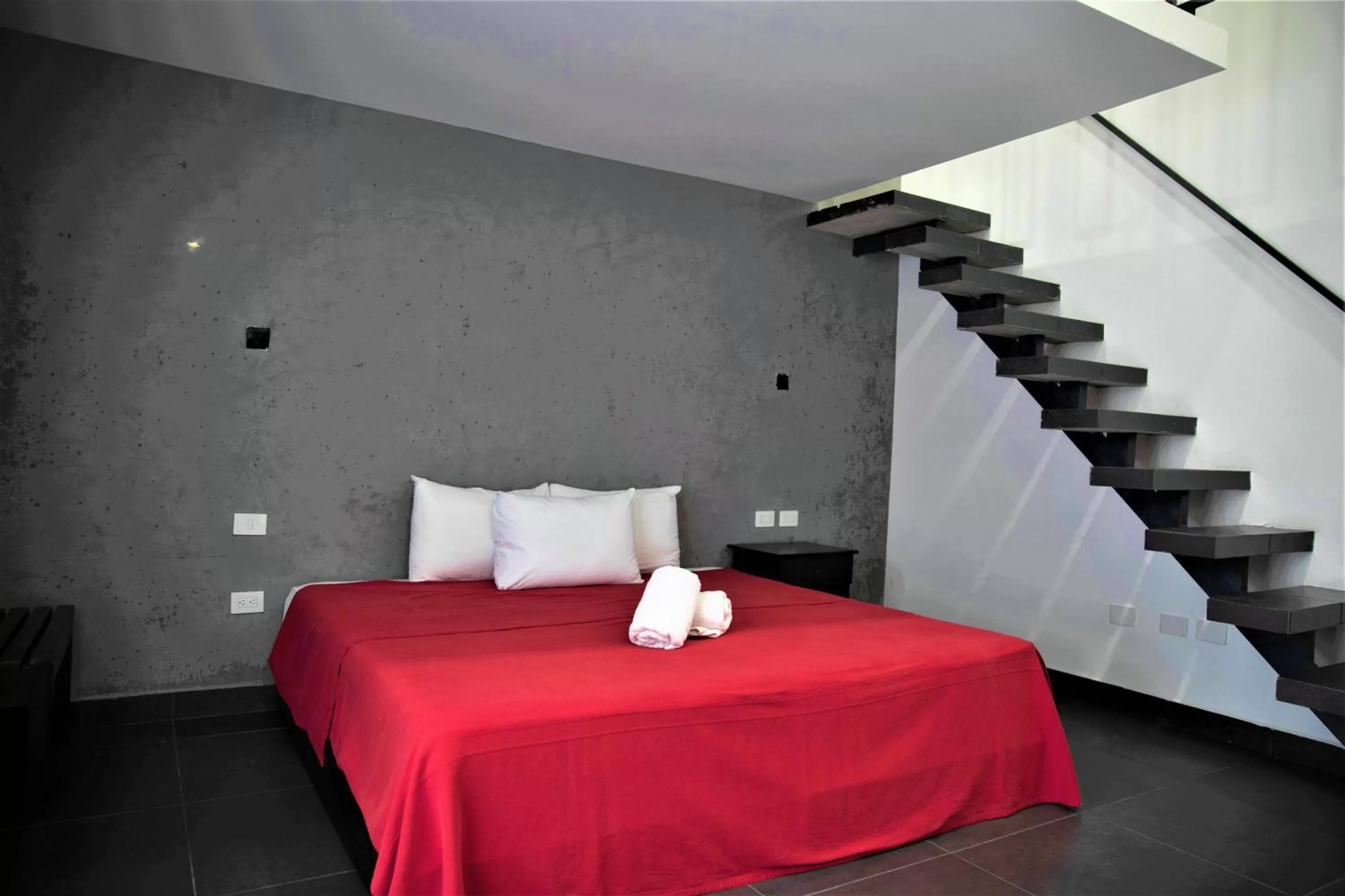 Photo of the whole room, Bed in Hotel Colonial Playa del Carmen