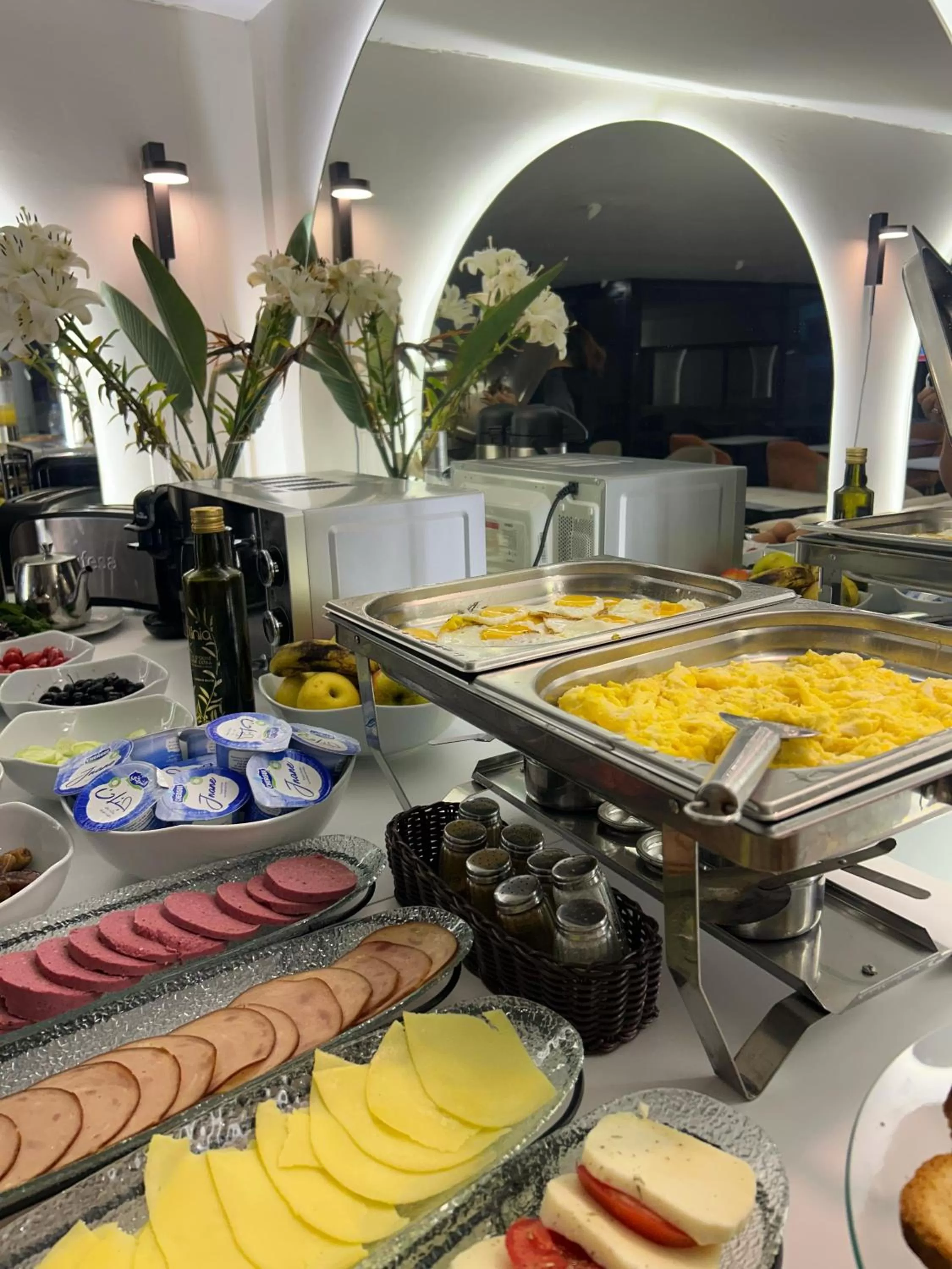 Buffet breakfast in Le M Hôtel