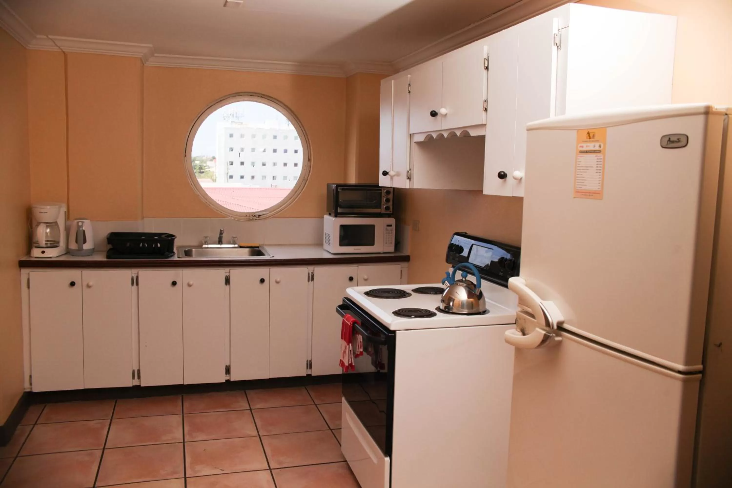 Kitchen or kitchenette in Heritage Hotel