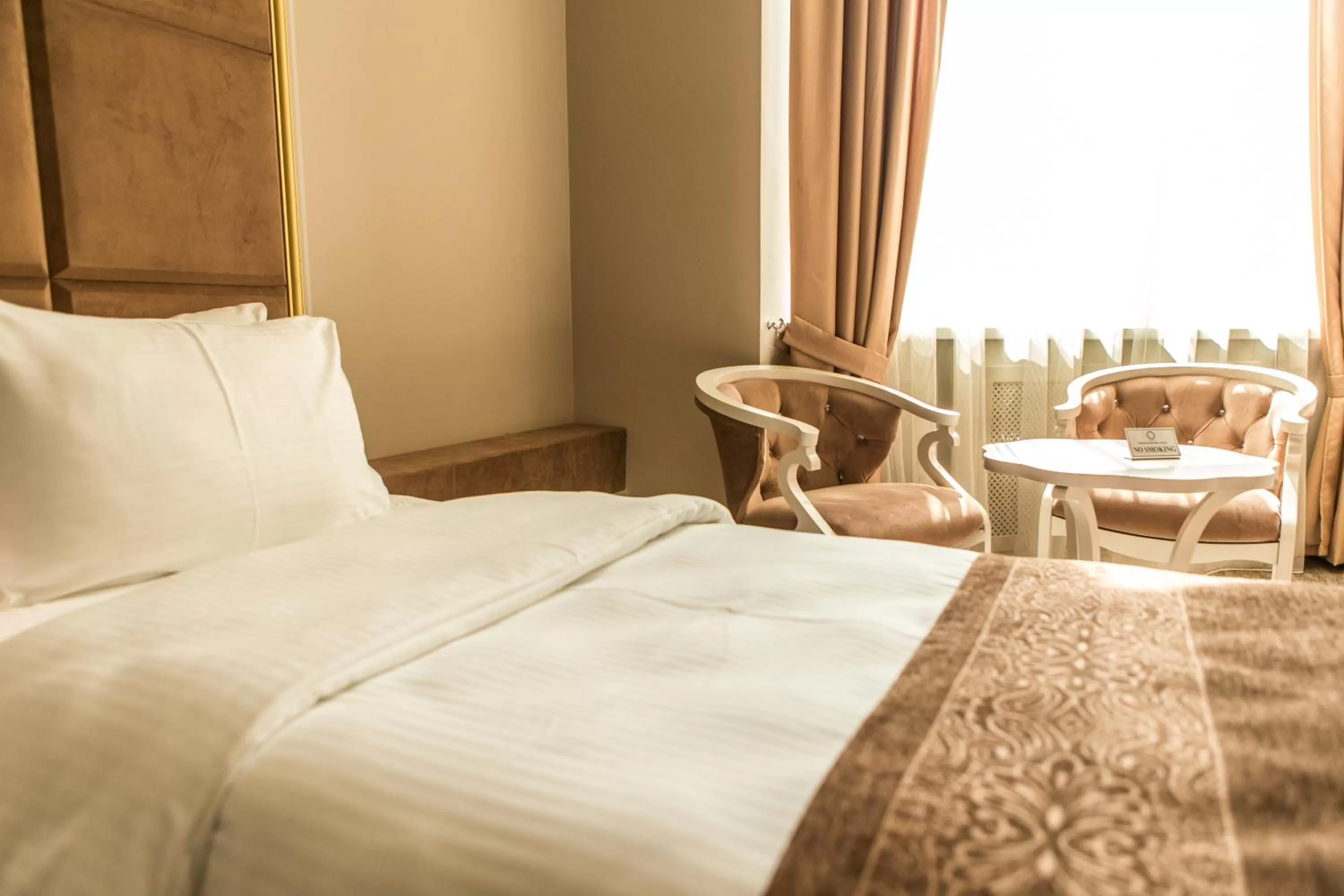 Decorative detail, Bed in Grand Sapphire Hotel