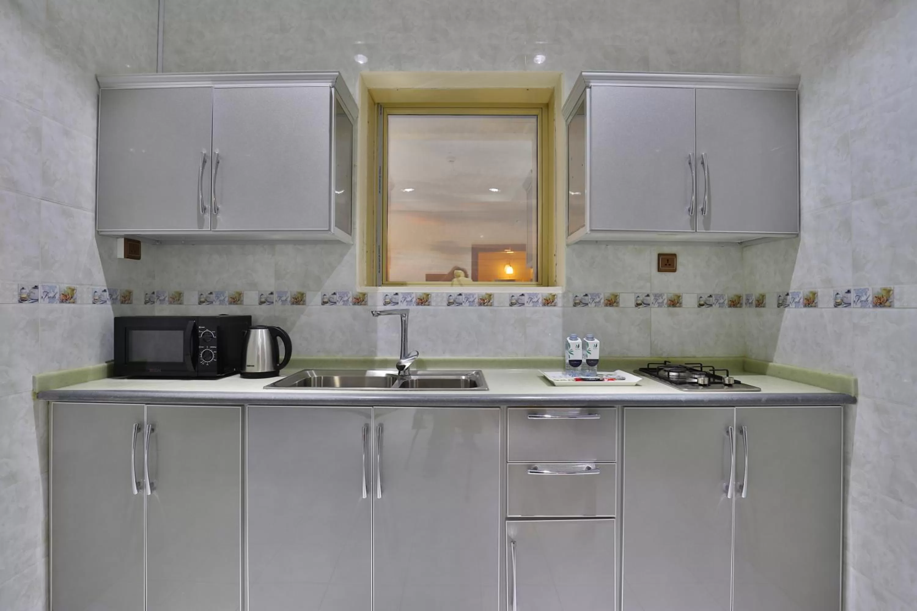 Kitchen or kitchenette, Kitchen/Kitchenette in Dreams Houses furnished Suites