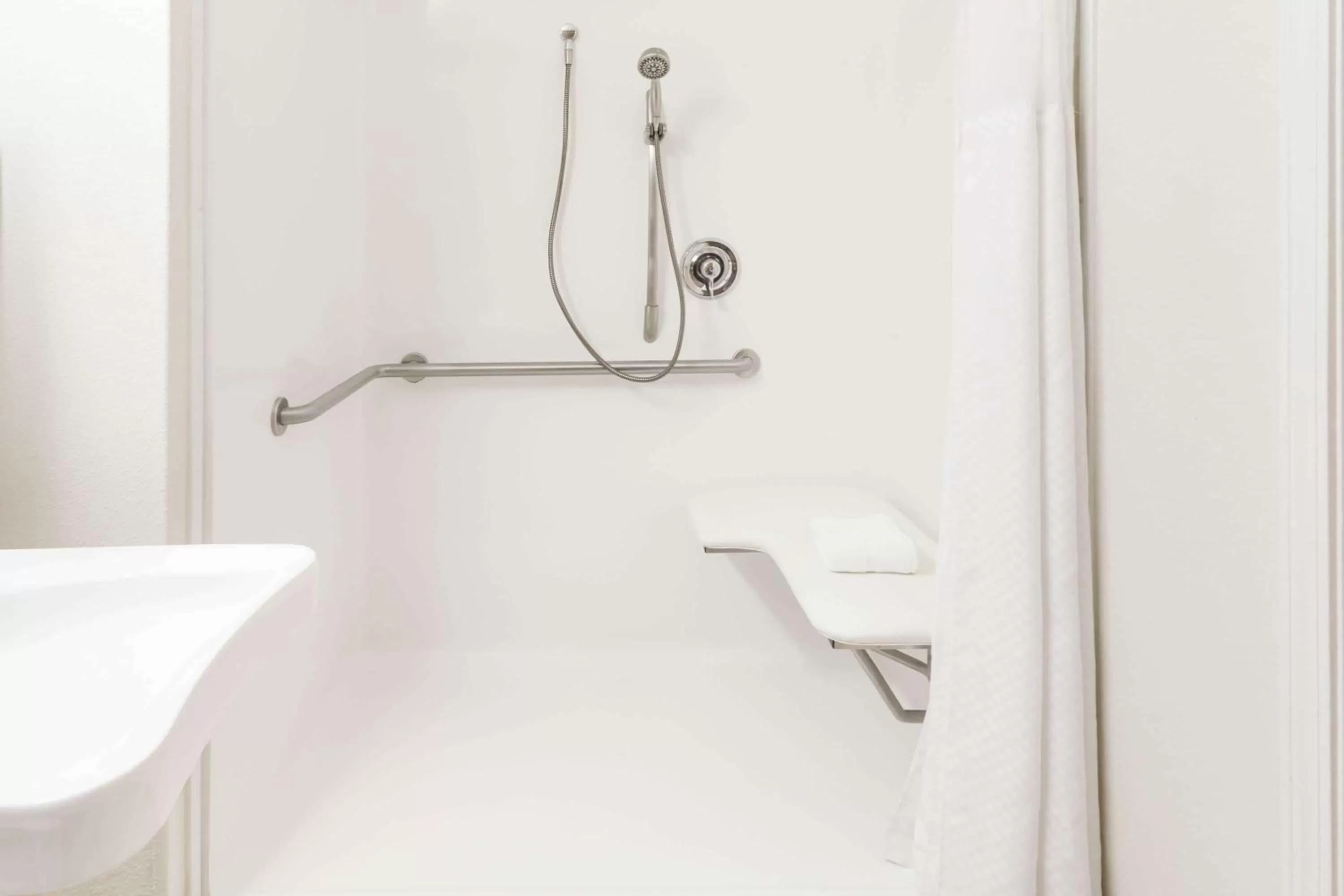 Bathroom in Microtel Inn by Wyndham Wilson