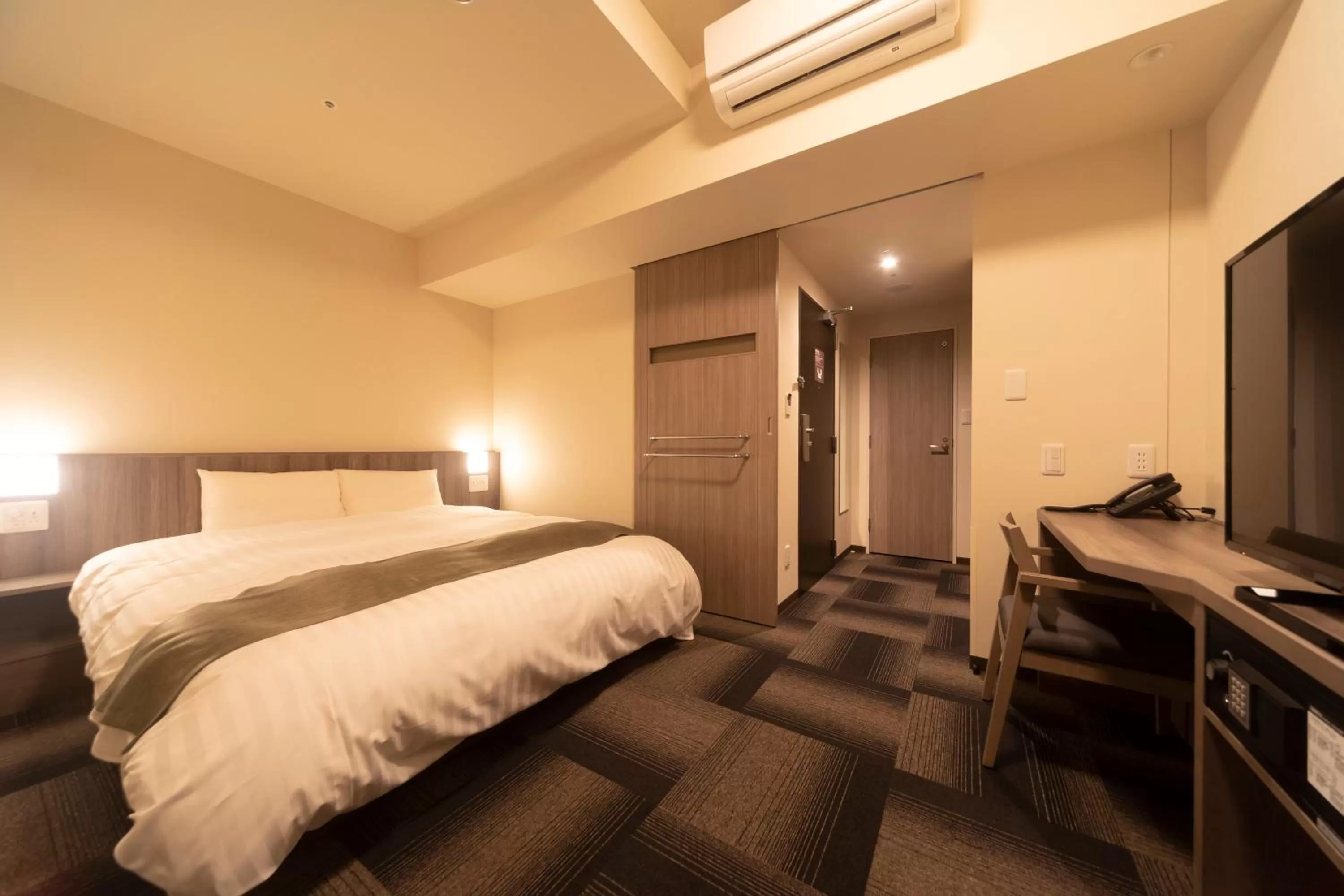 Bed in Dormy Inn Korakuen