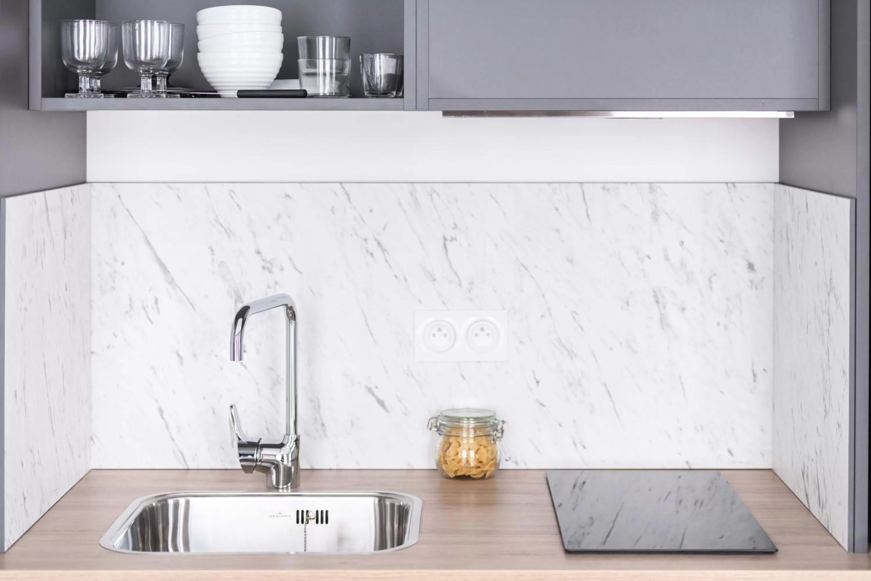 Kitchen or kitchenette in Appart'City Collection Saint Germain en Laye