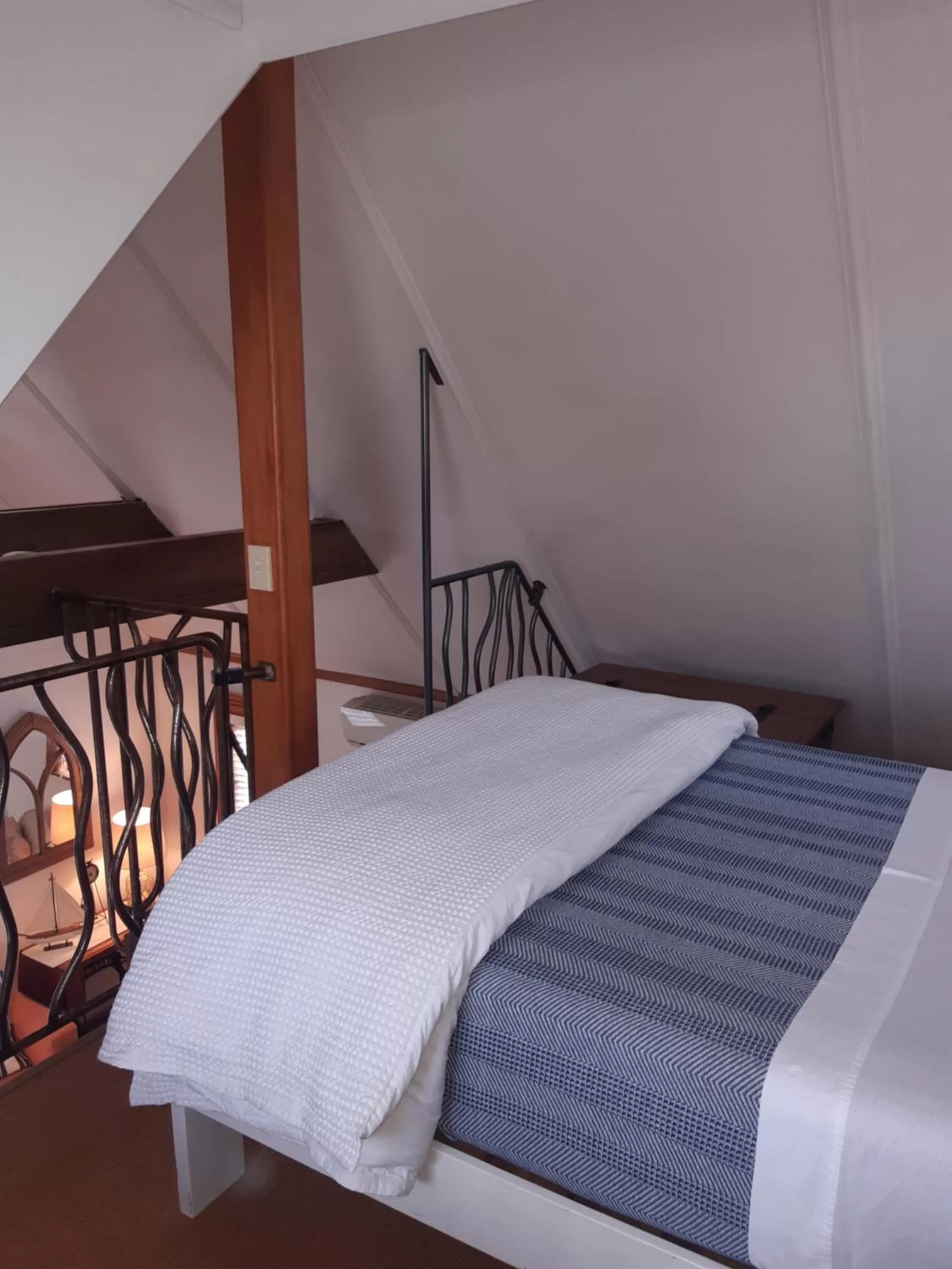 Bed in Harbour View Cottage