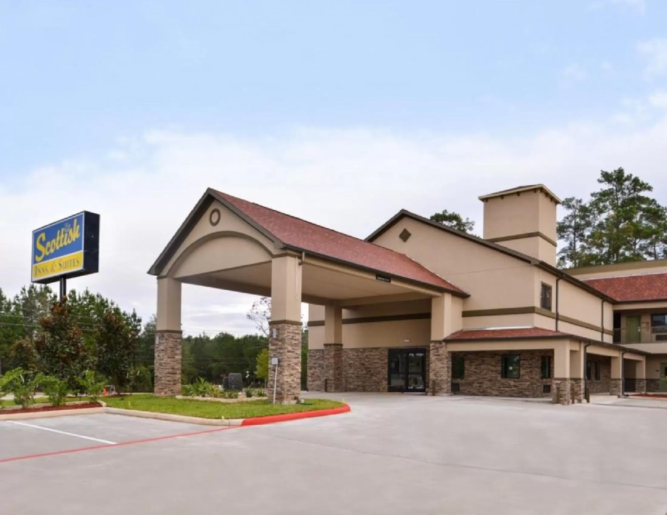 Property building in Scottish Inn & Suites - Conroe