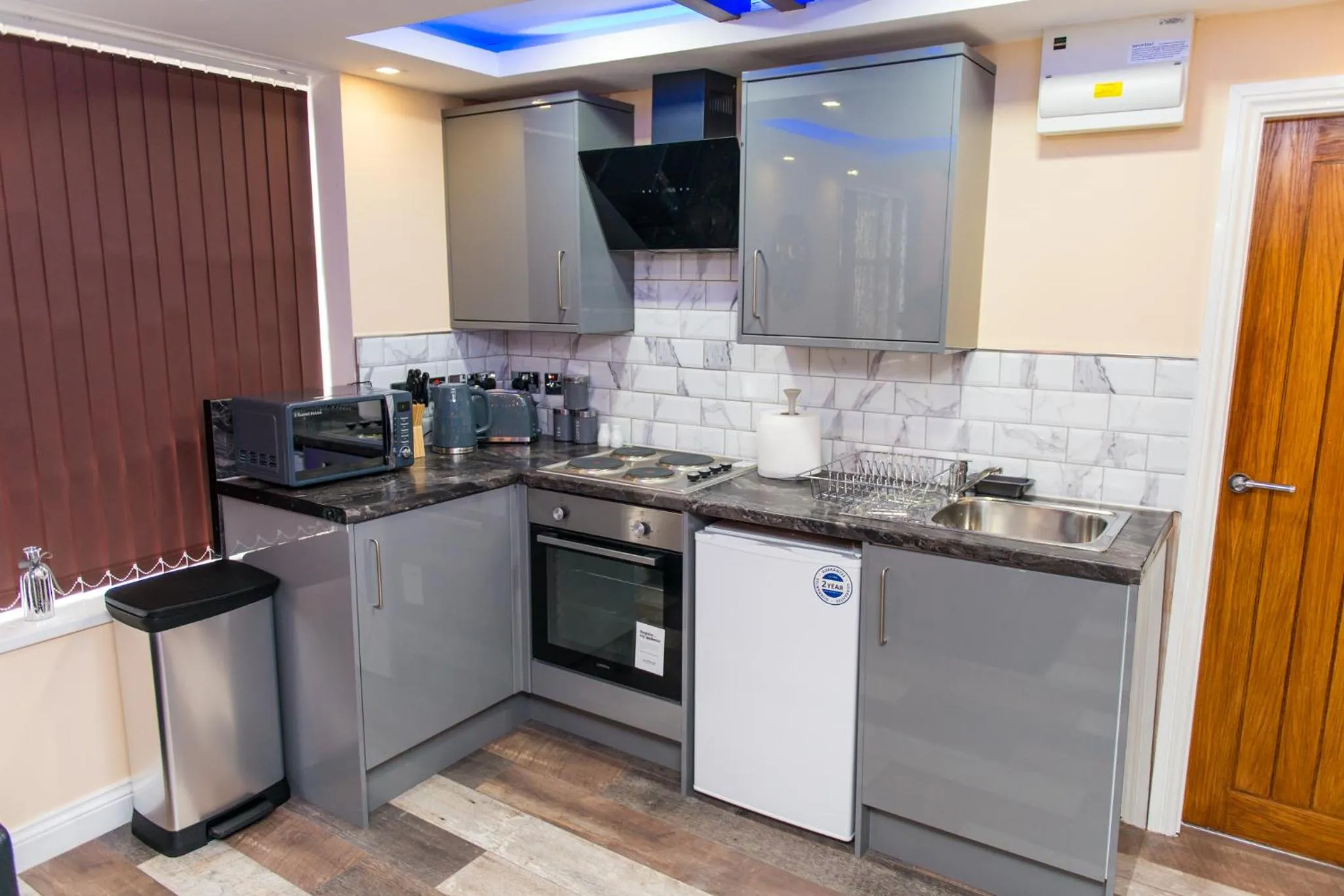 Kitchen or kitchenette in Sawrey Serviced Apartments