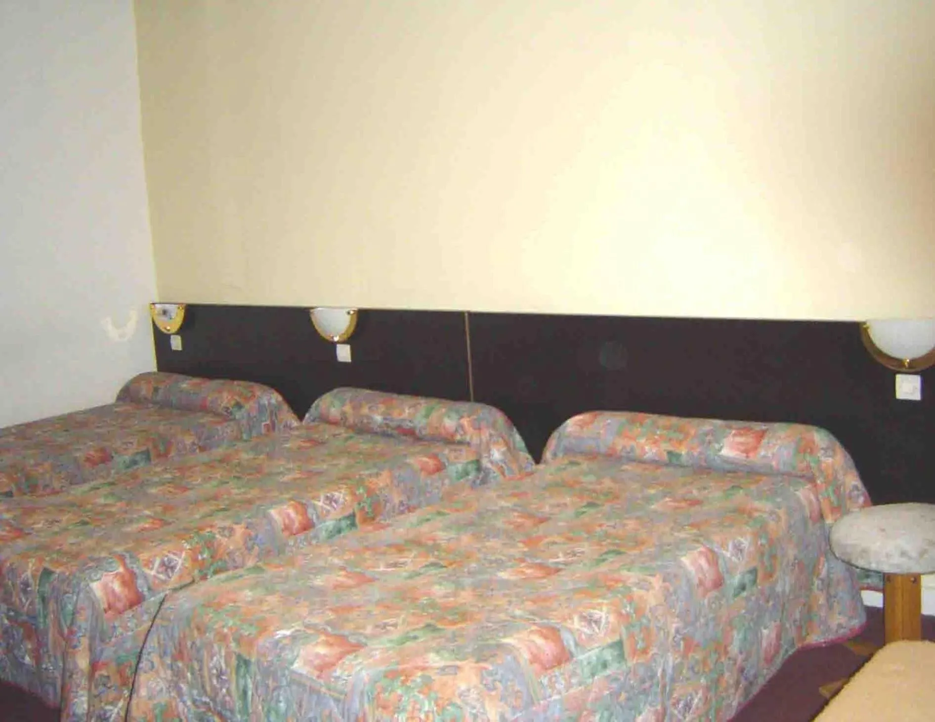 Bed in Hotel Ferney République