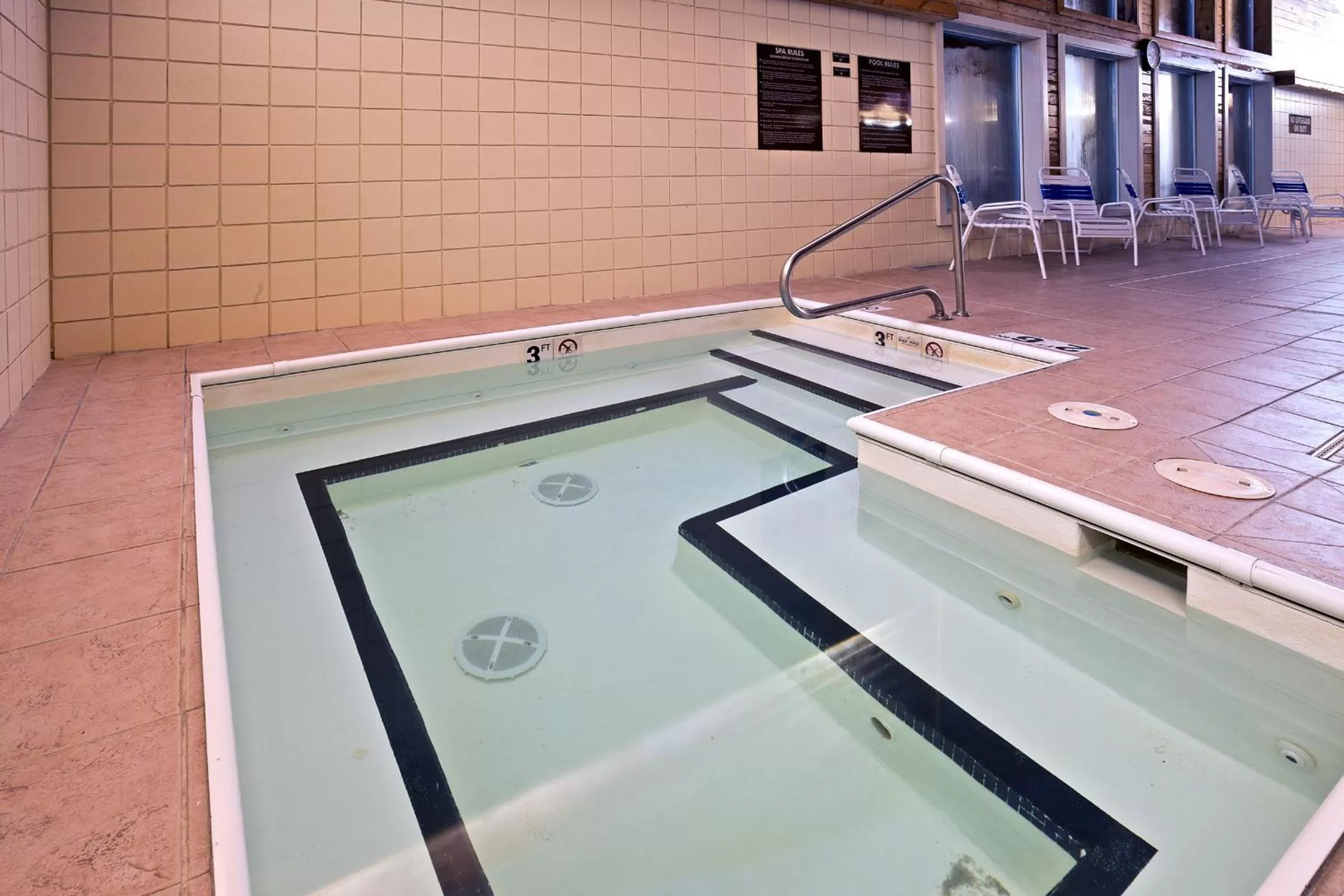 Swimming pool in AmericInn by Wyndham Bay City