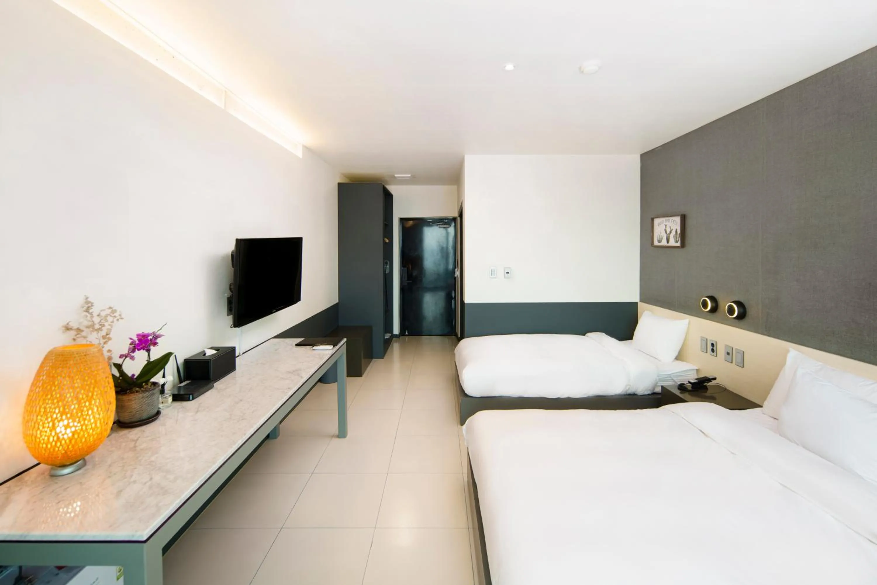 Bed in Lareem Boutique Hotel