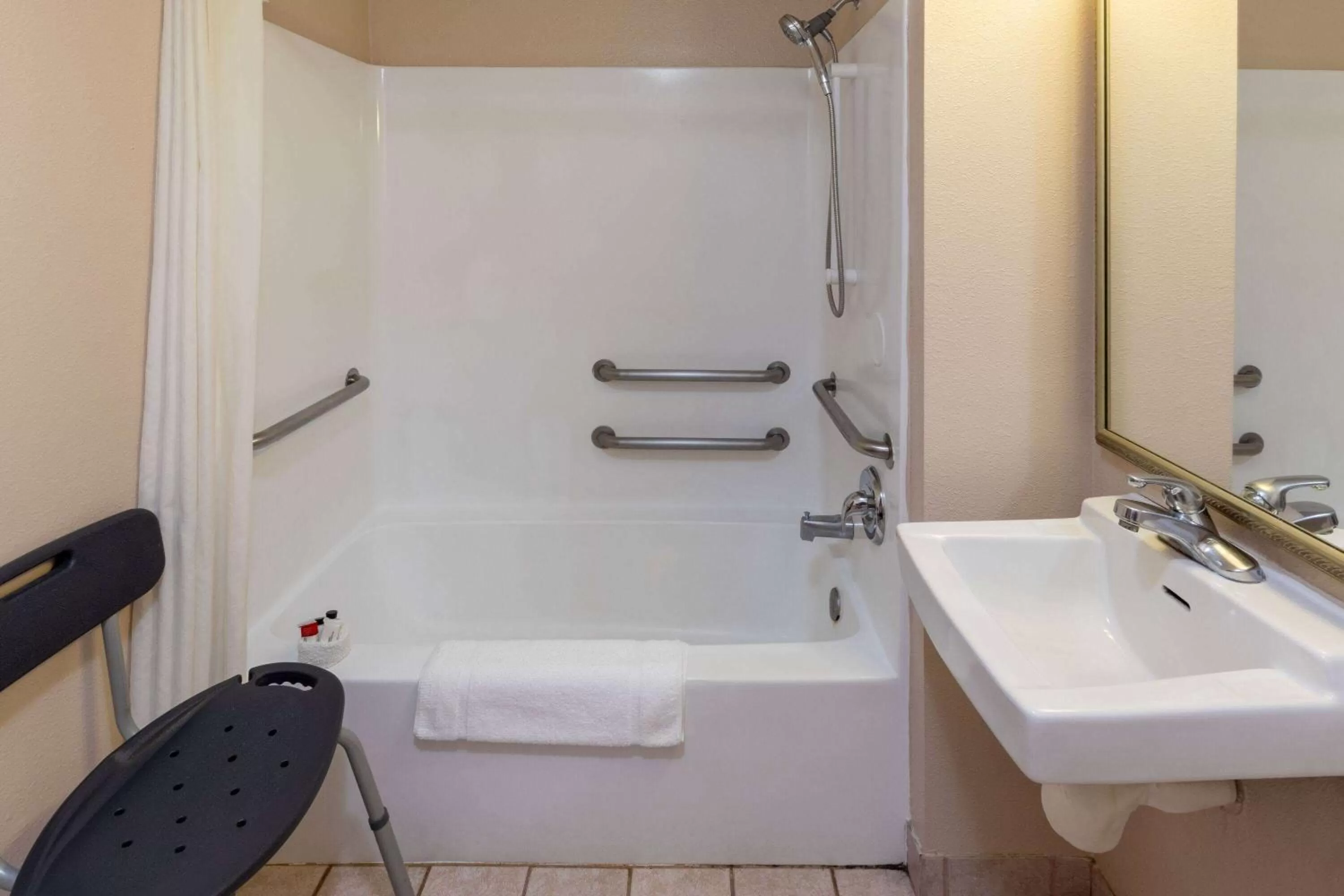 Bathroom in Super 8 by Wyndham Garland Rowlett East Dallas Area