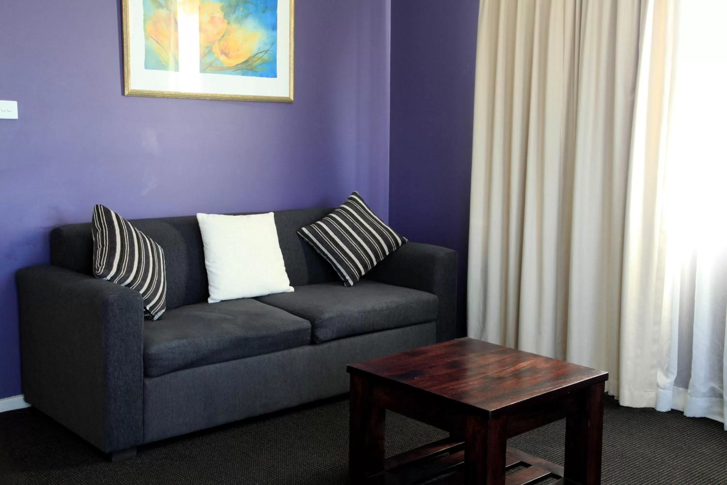 Living room in Travellers Motor Village