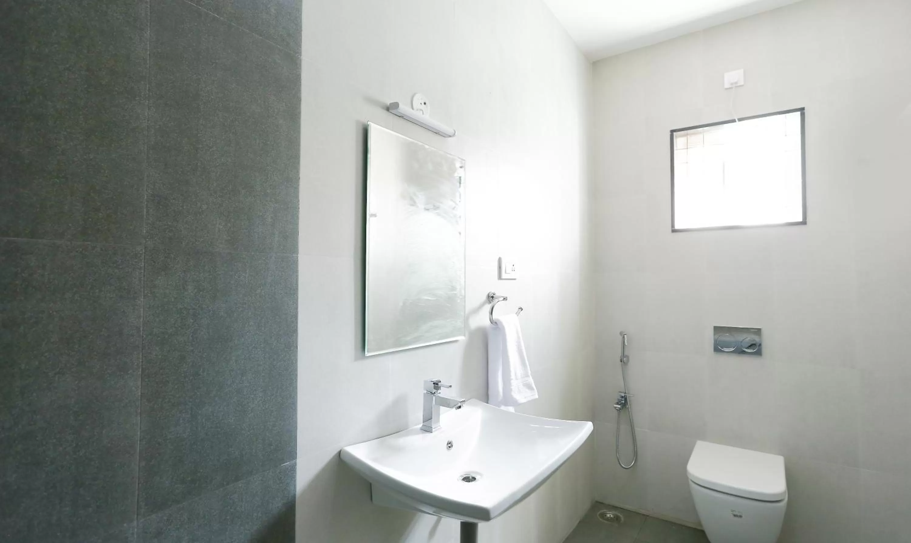 Bathroom in Treebo Hi Line Apartments Kalapatti