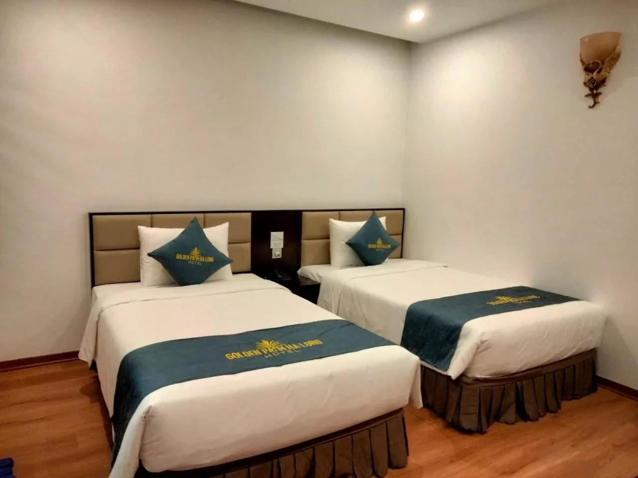 Bed in Golden Palm HaLong Hotel