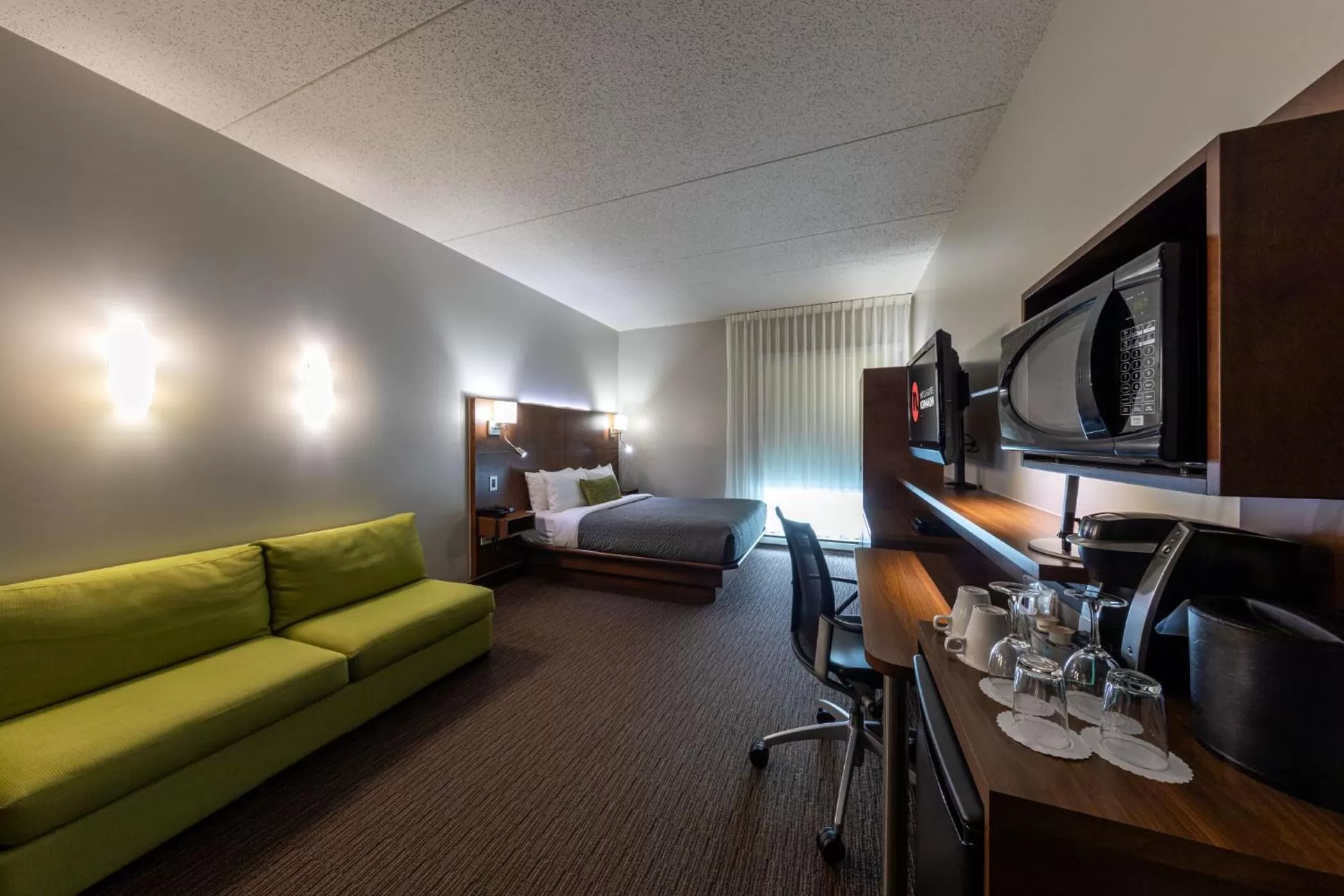 Bed in Hôtel & Suites Normandin Québec