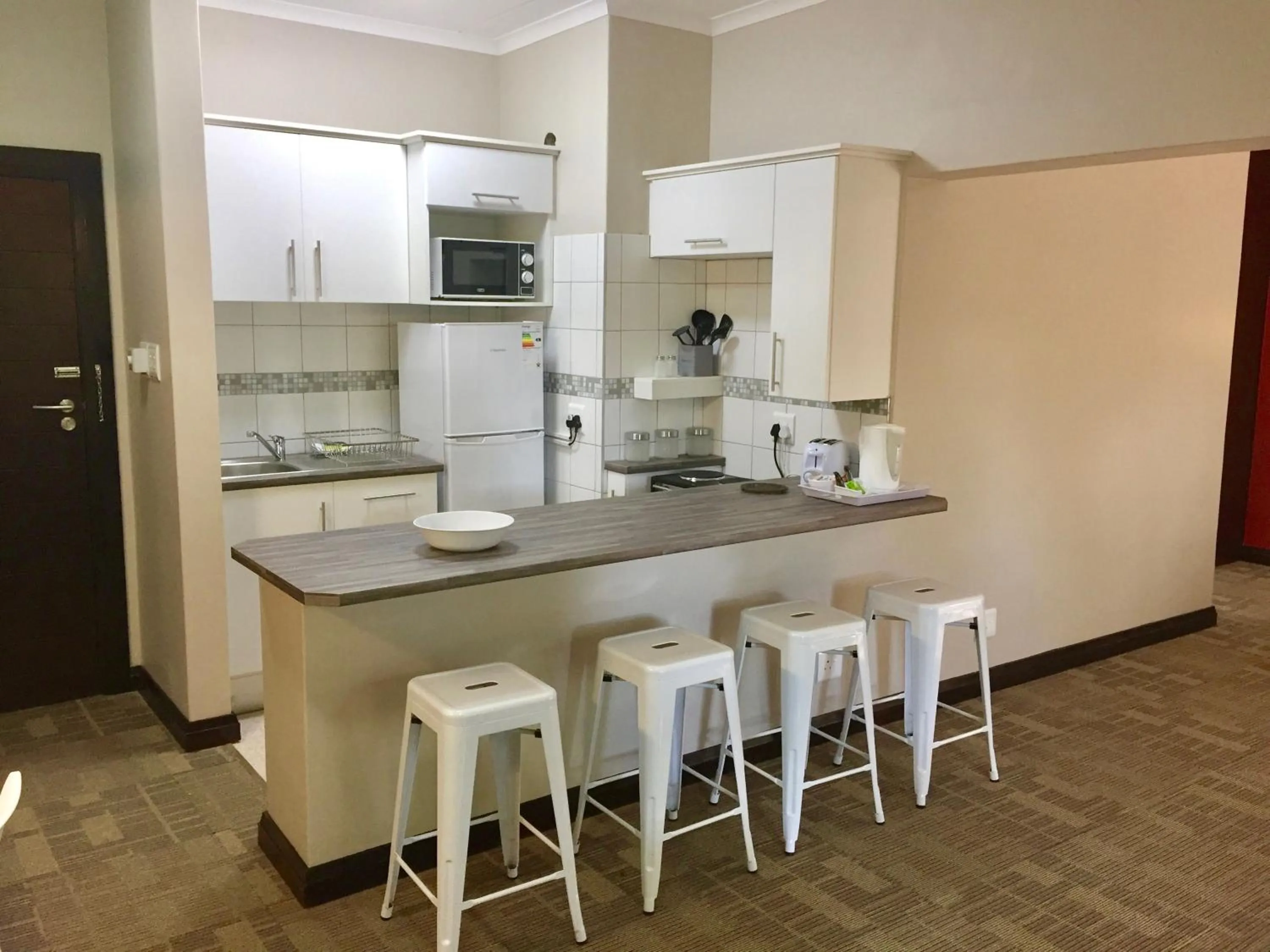 Kitchen or kitchenette in The Hub Urban Hotel