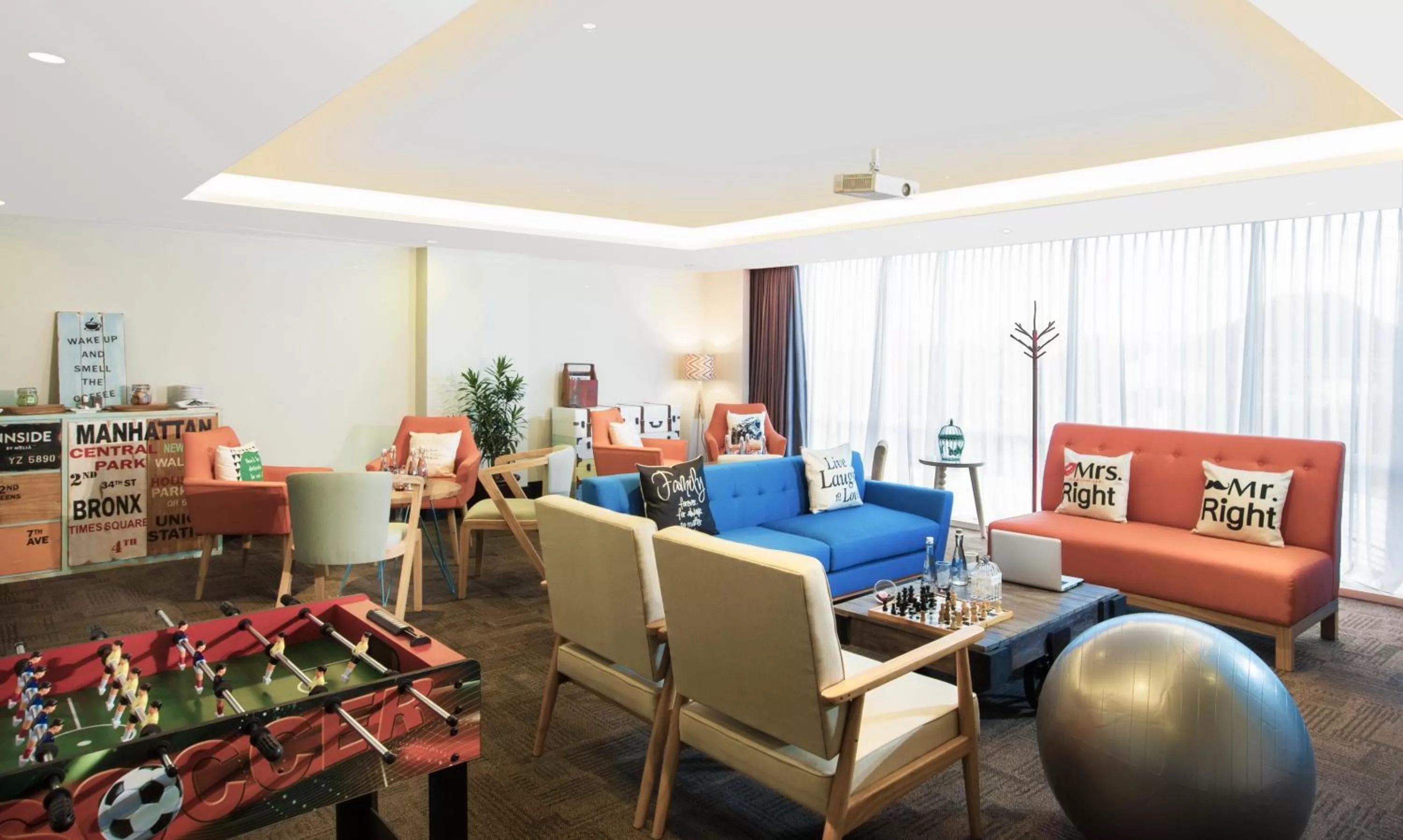 Living room in INNSiDE by Meliá Yogyakarta