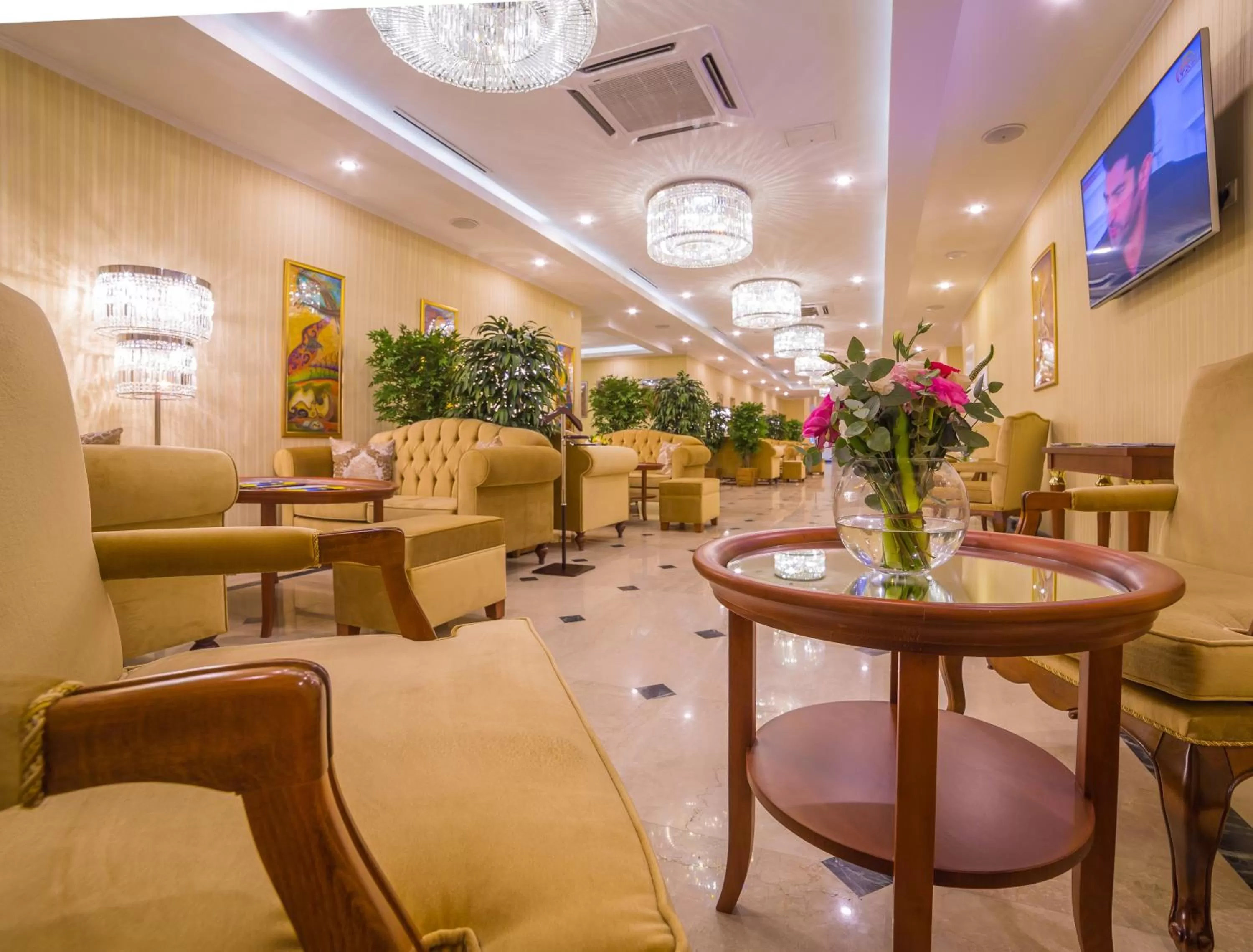 Lobby or reception in Ramada by Wyndham Almaty