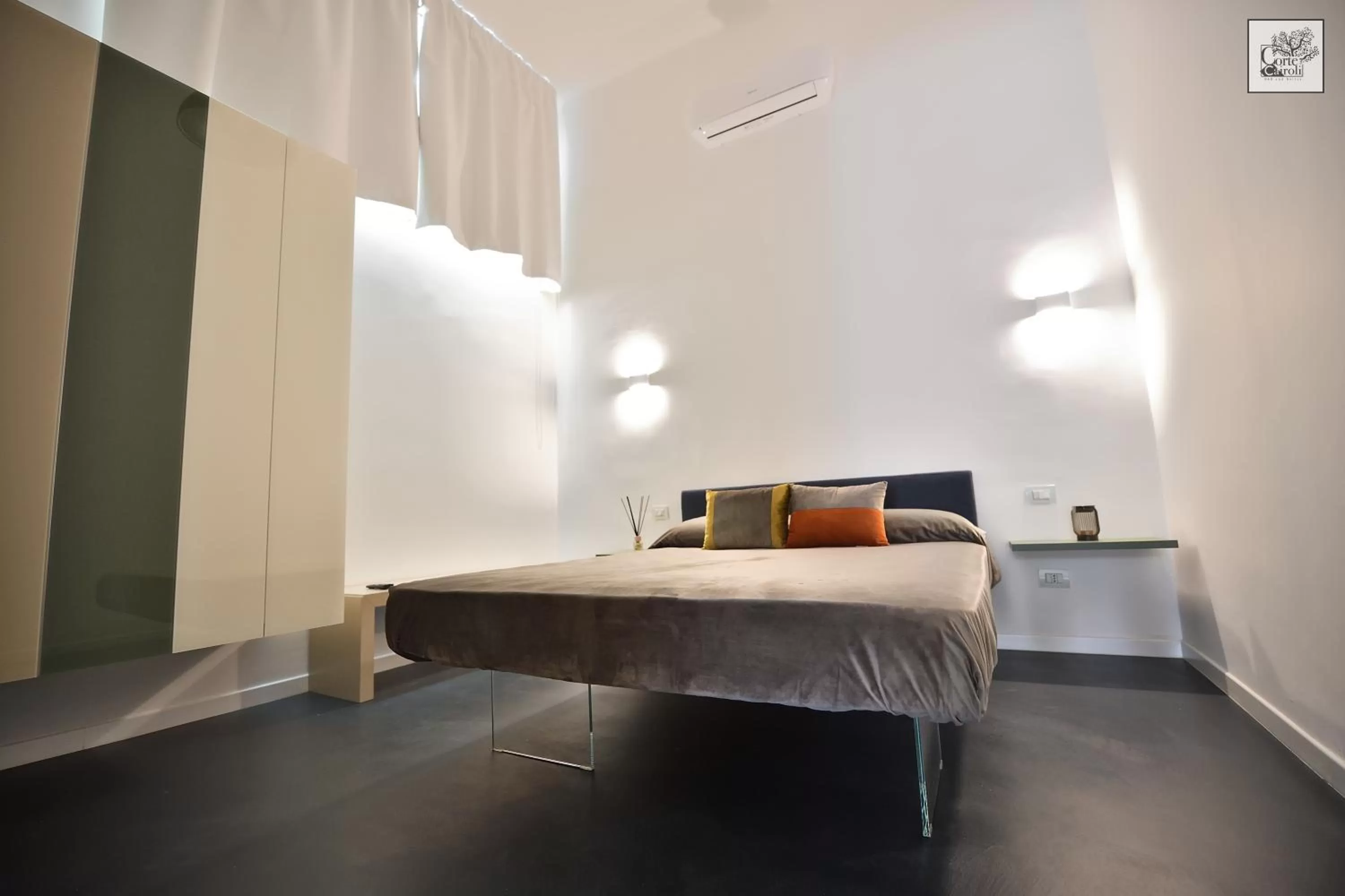 Bed in Corte Cairoli B&B and Suites