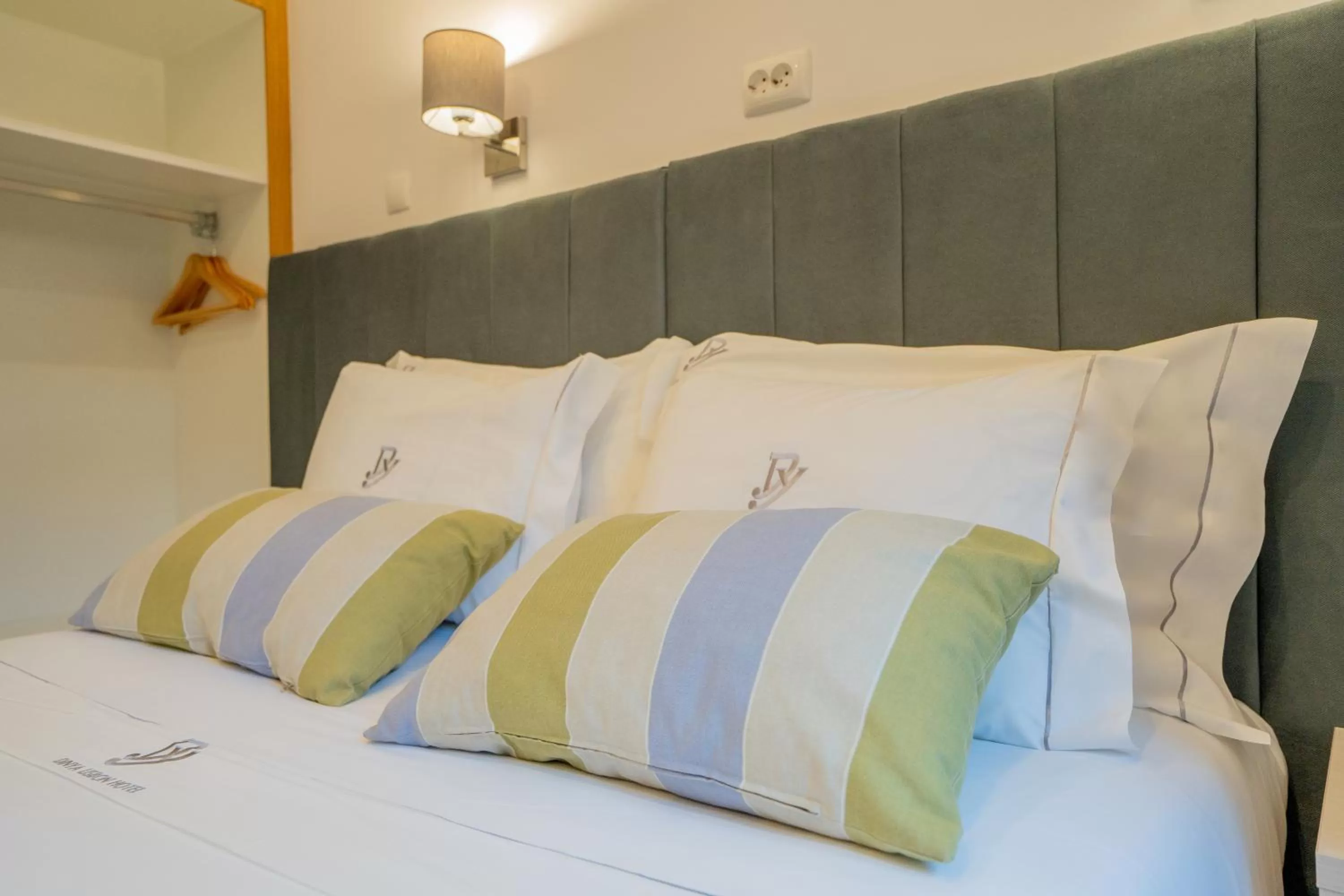 Bed in Dinya Lisbon Hotel