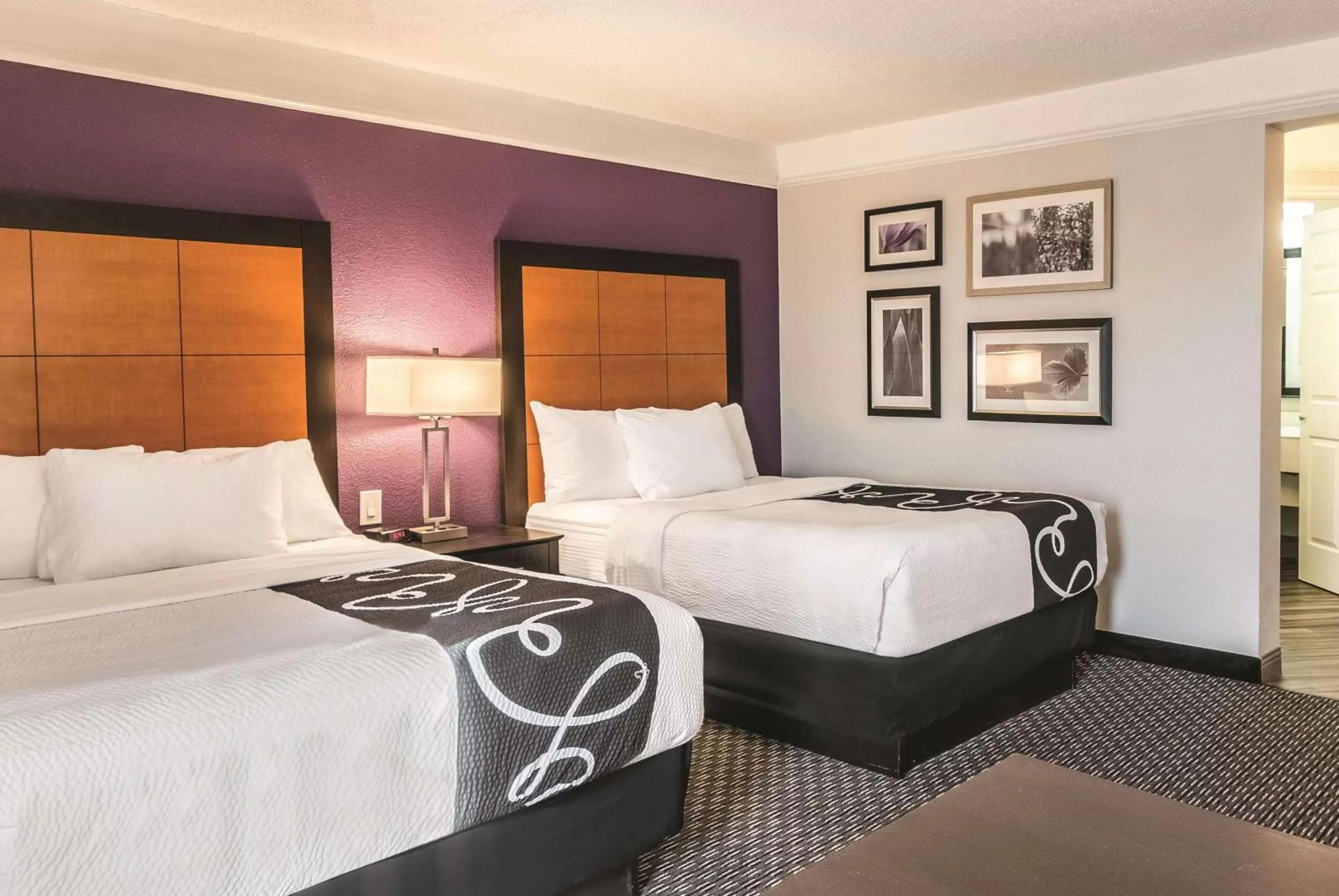 Photo of the whole room, Bed in La Quinta by Wyndham Orlando Airport North - Free Airport Shuttle!