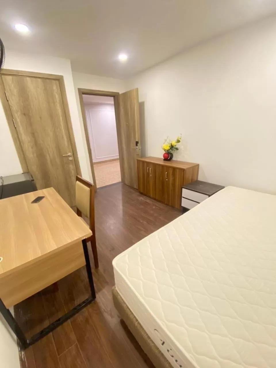 Bed in Ivy Hotel & Apartment