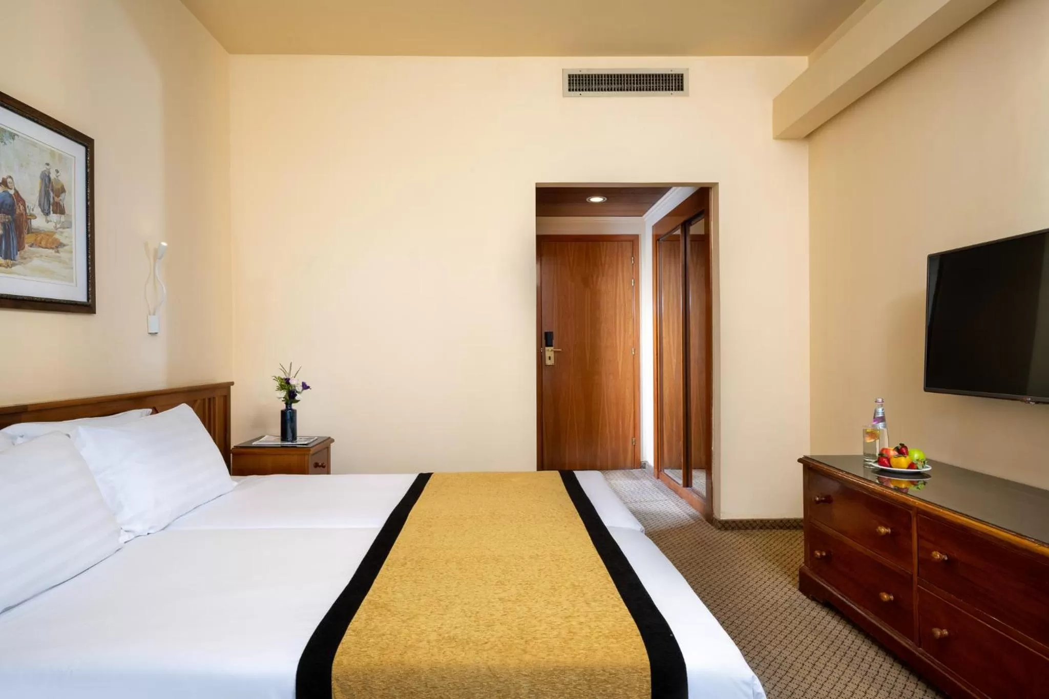 Bed in Olive Tree Hotel