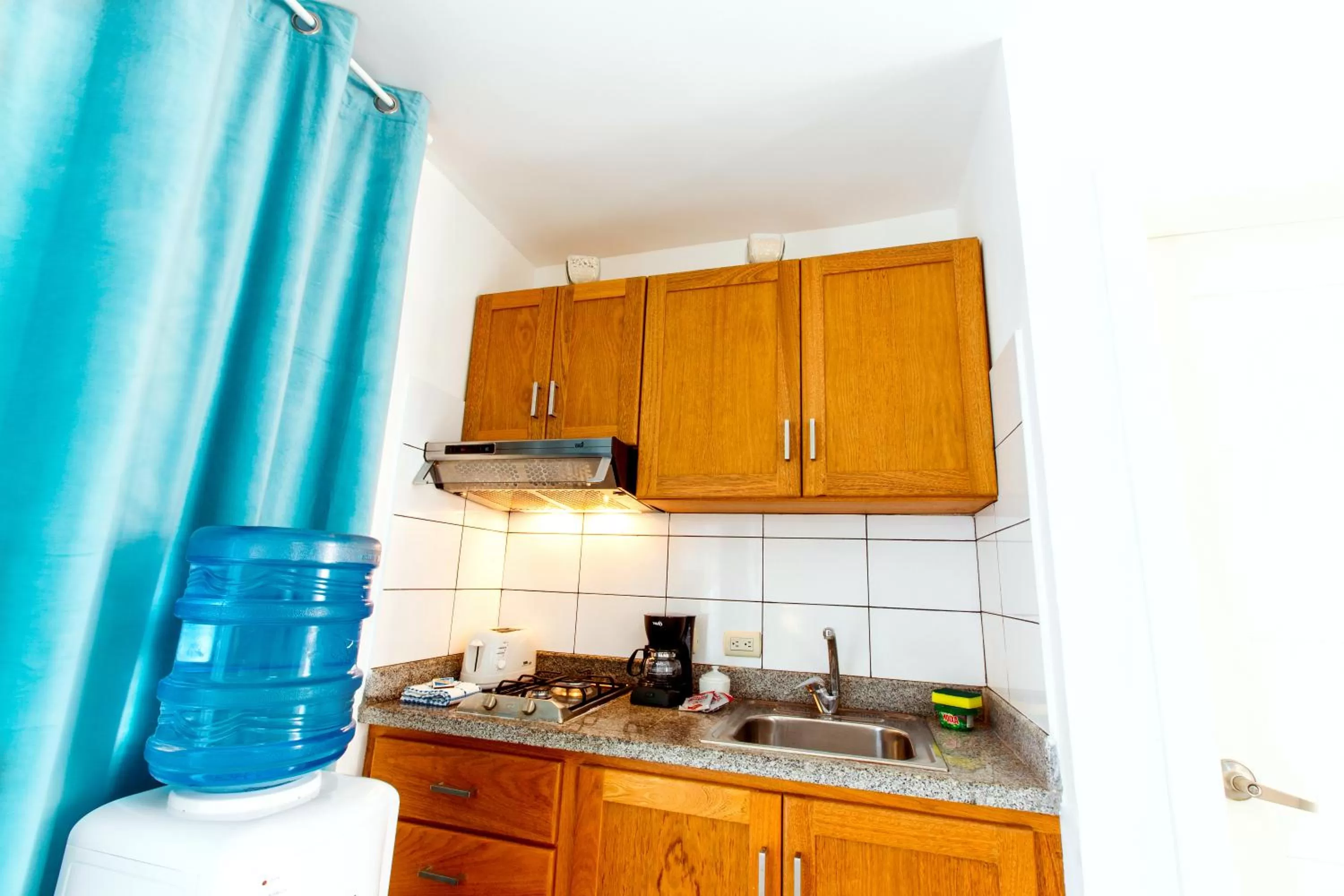 Kitchen or kitchenette, Kitchen/Kitchenette in TROPICANA SUITES DELUXE BEACH CLUB and POOL - playa LOS CORALES