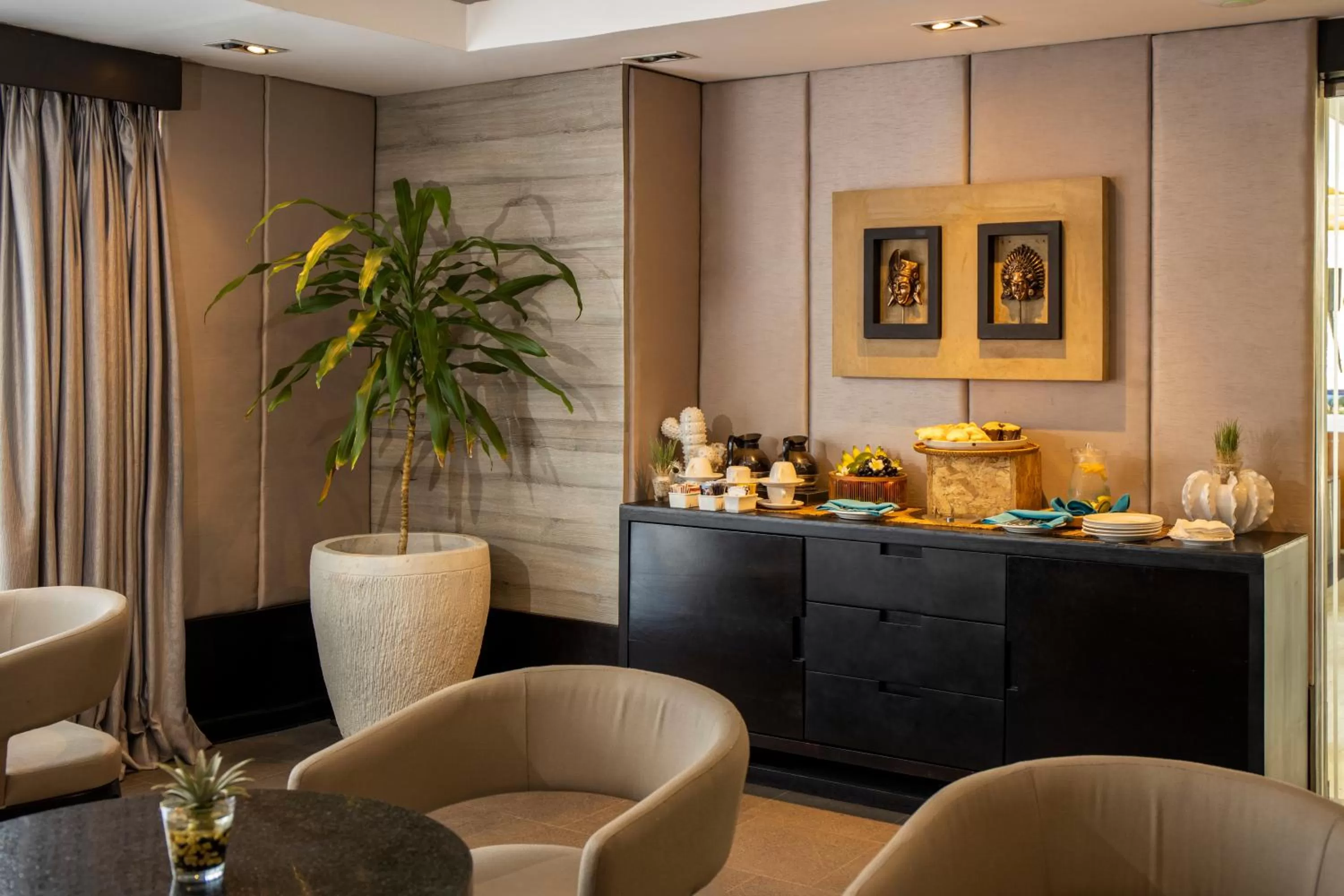 Communal lounge/ TV room in Away Bali Legian Camakila