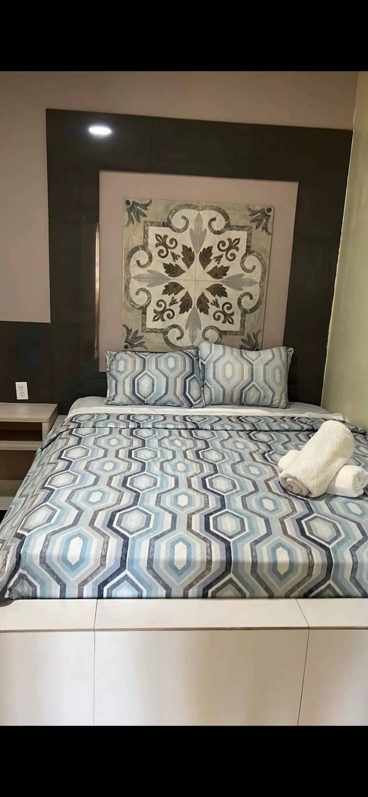 Bed in Curasita colour Appartments