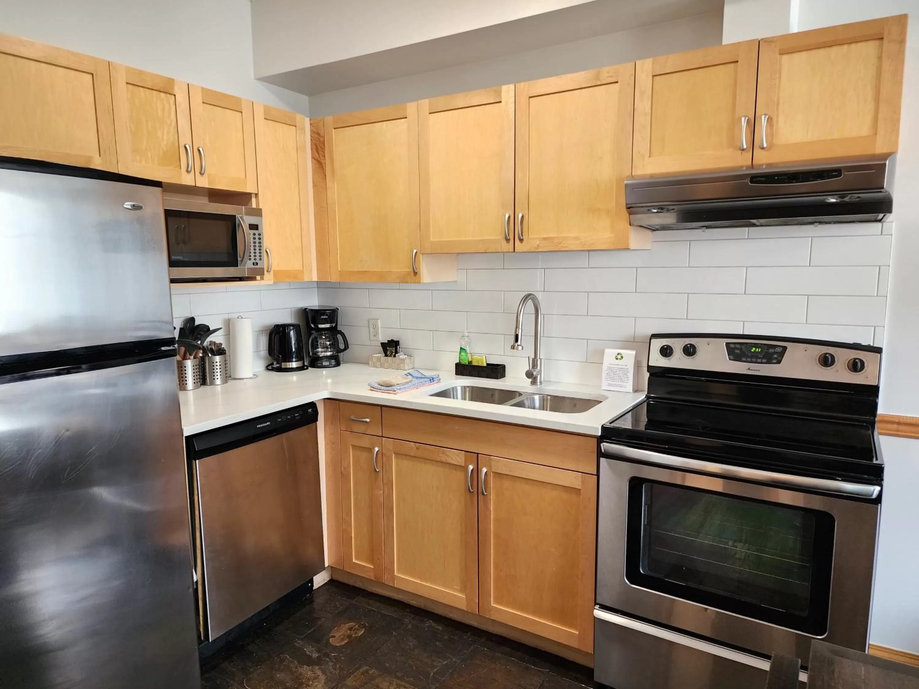 kitchen in Sunset Resorts Canmore and Spa