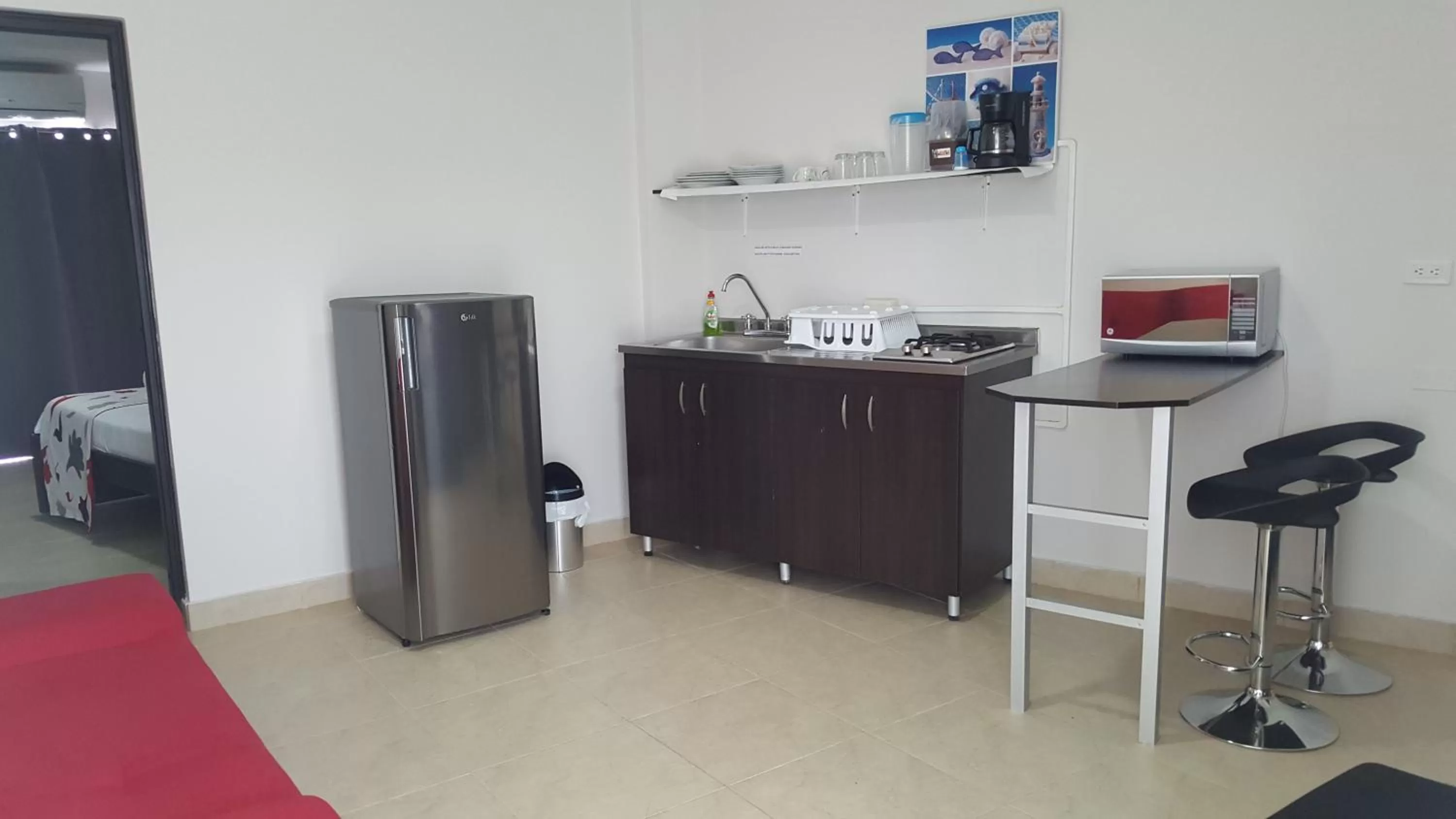 Kitchen/Kitchenette in Caribbean Island Hotel Piso 2