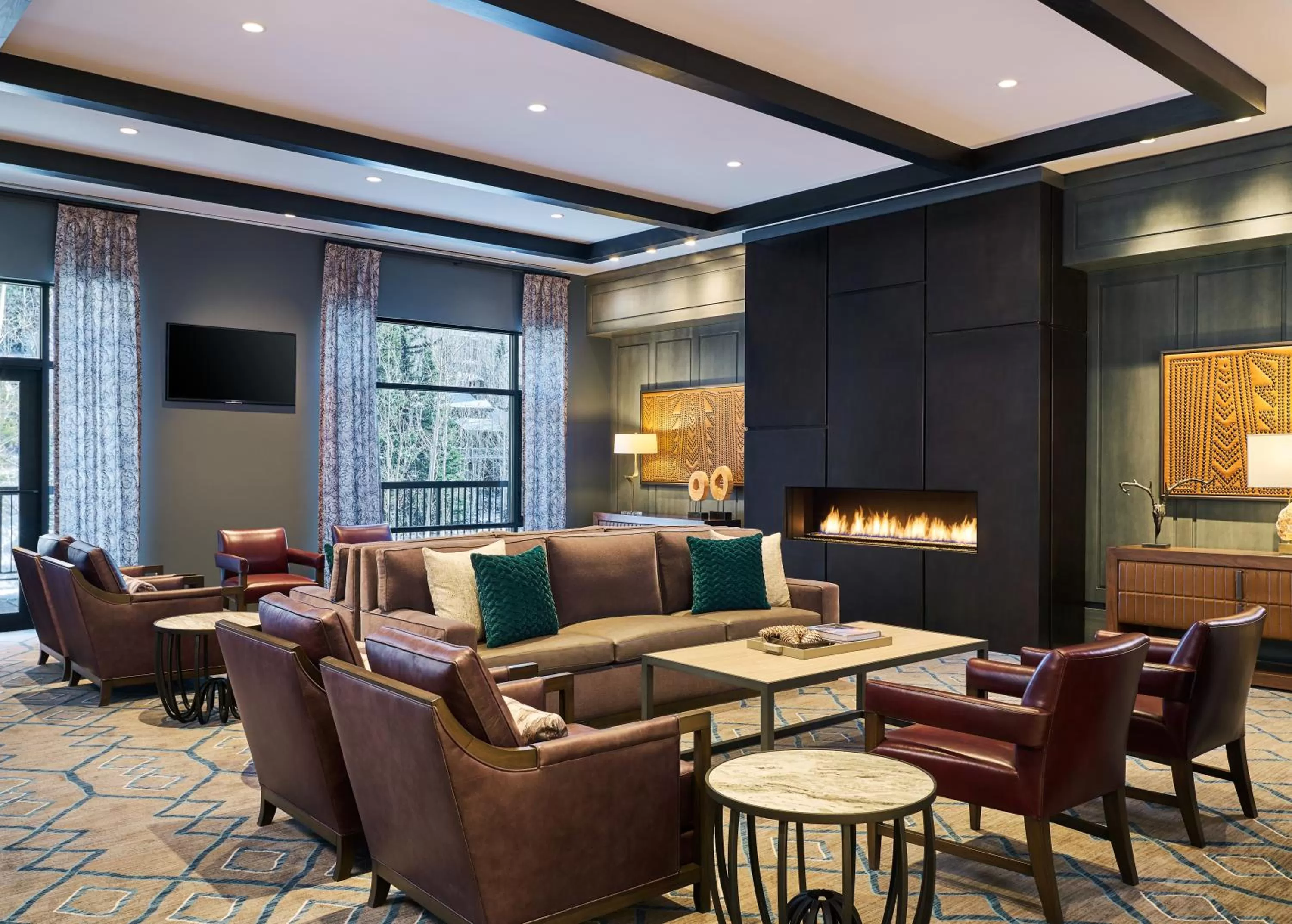 Communal lounge/ TV room in Vail Residences at Cascade Village, a Destination by Hyatt Residence