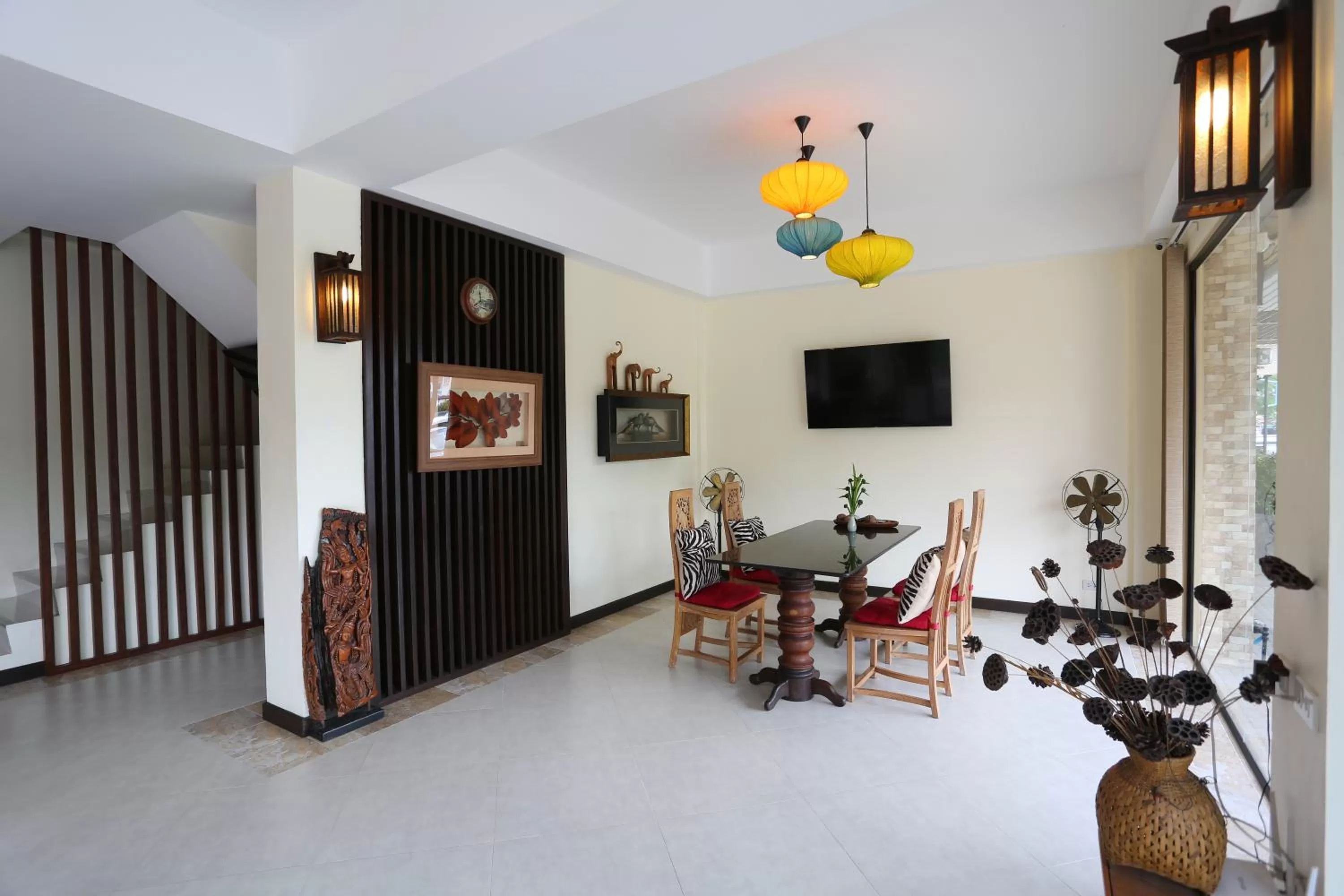 Communal lounge/ TV room in Chivapuri Trat