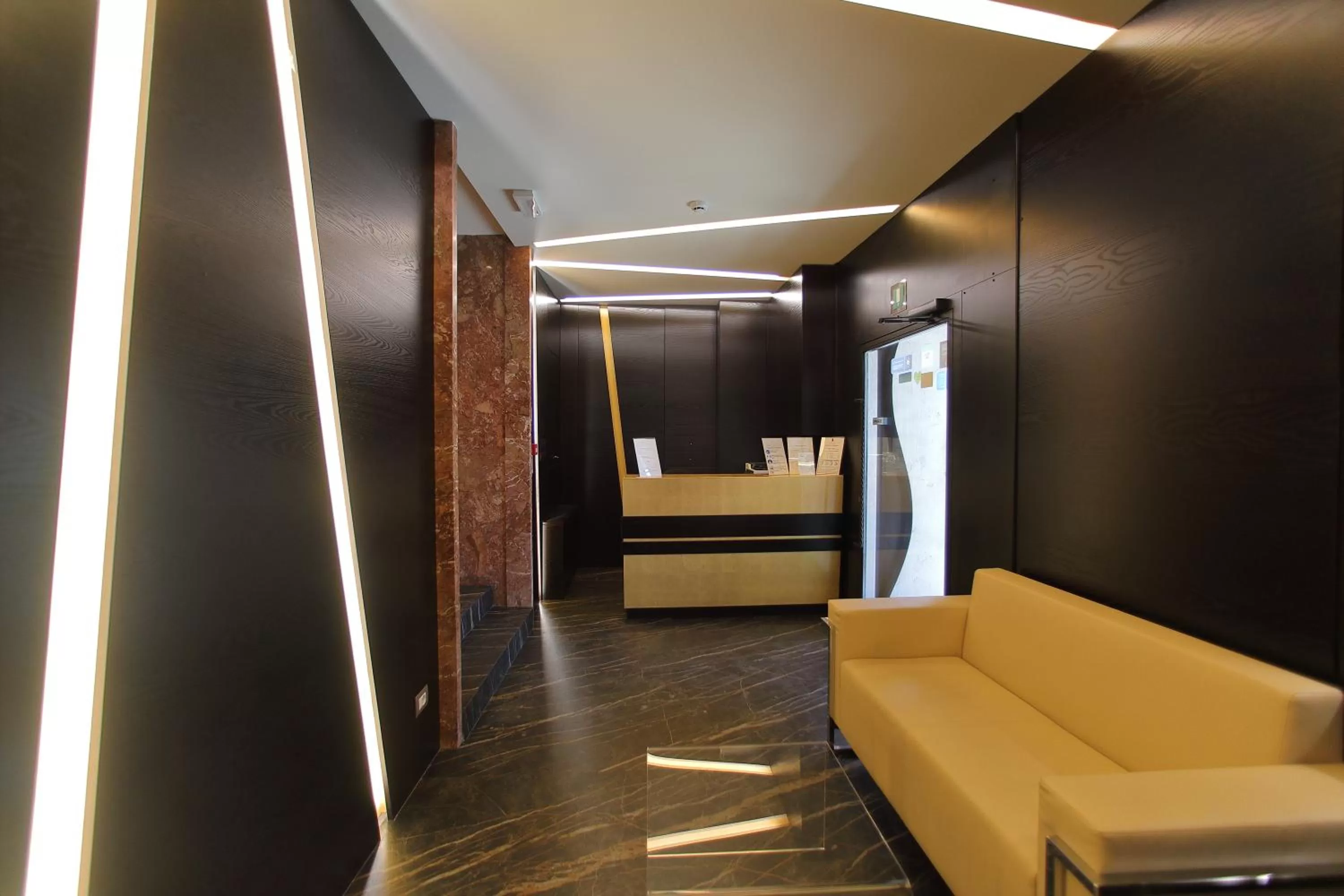 Lobby or reception in Hotel Bell'arrivo by Dori