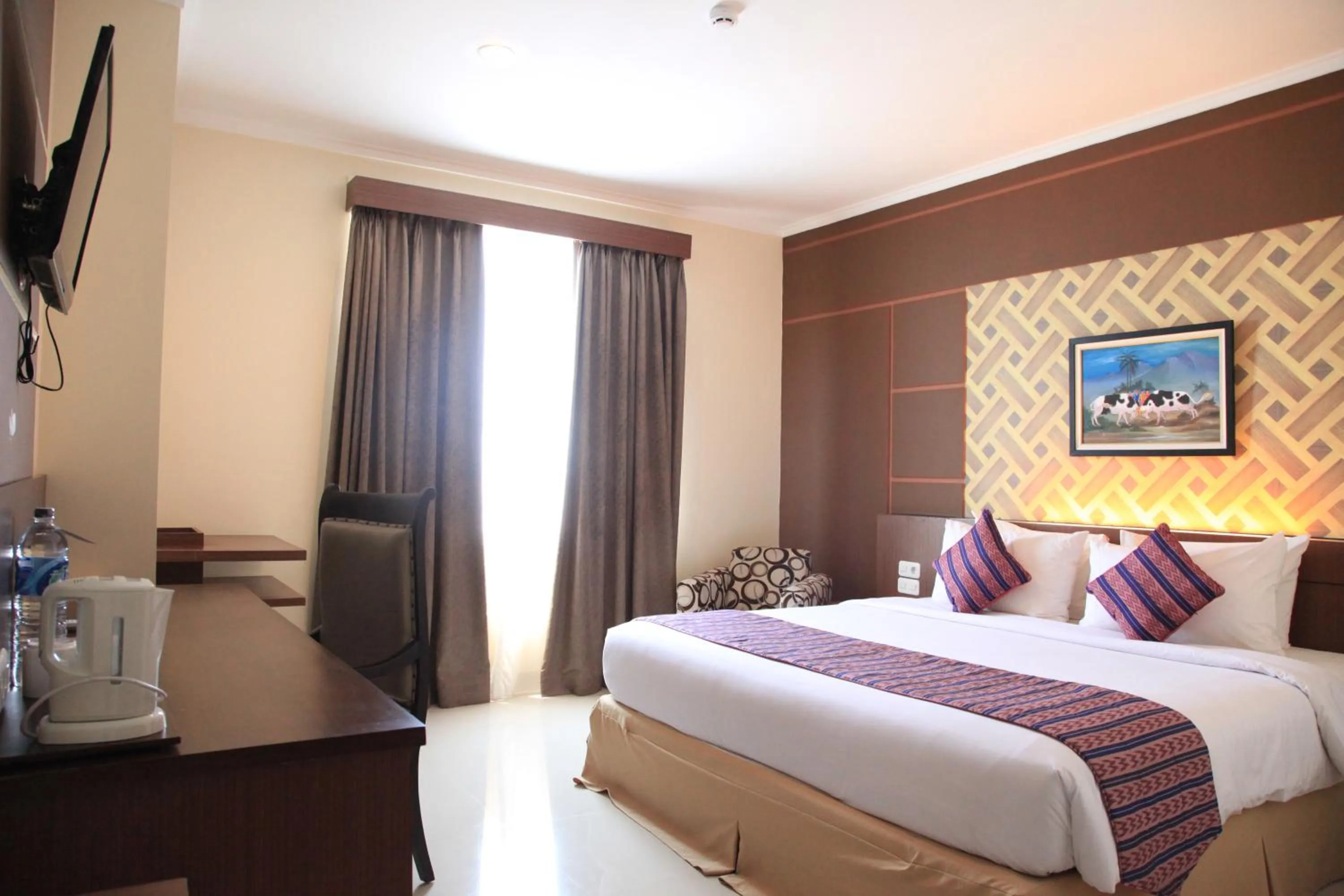 Bed in Aerotel Smile Losari