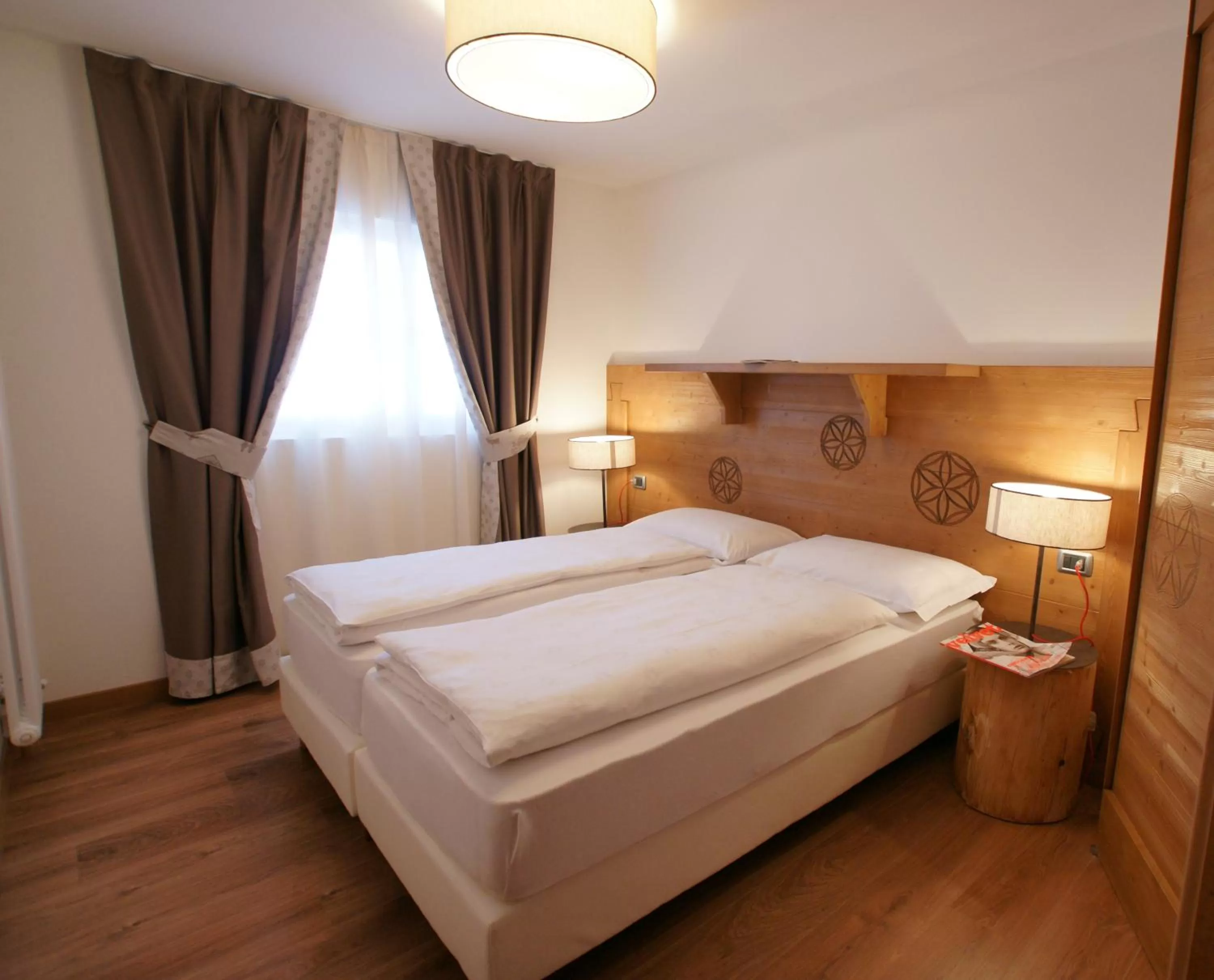 Bed in Adler Family and Wellness ApartHotel