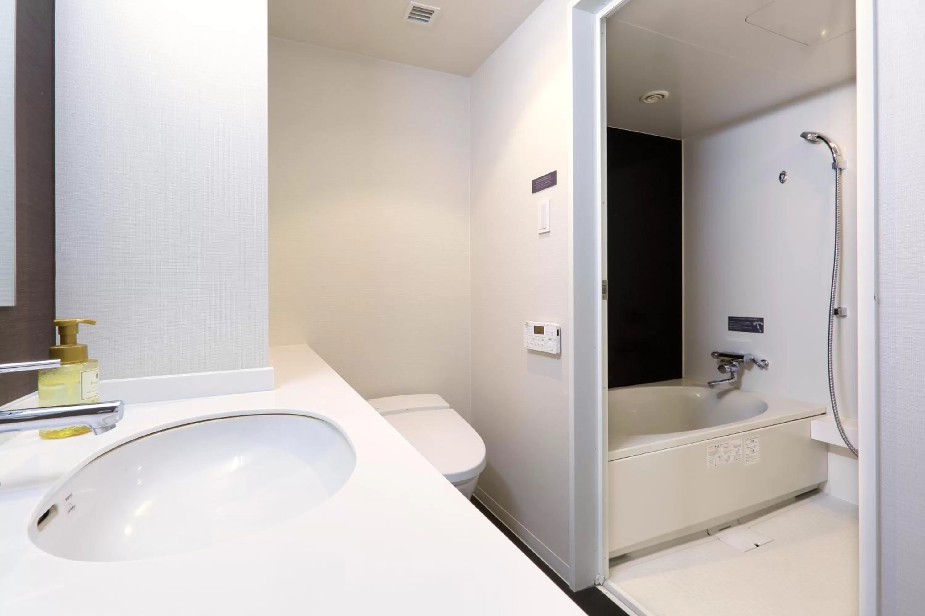 Bathroom, Bed in JR Inn Sapporo