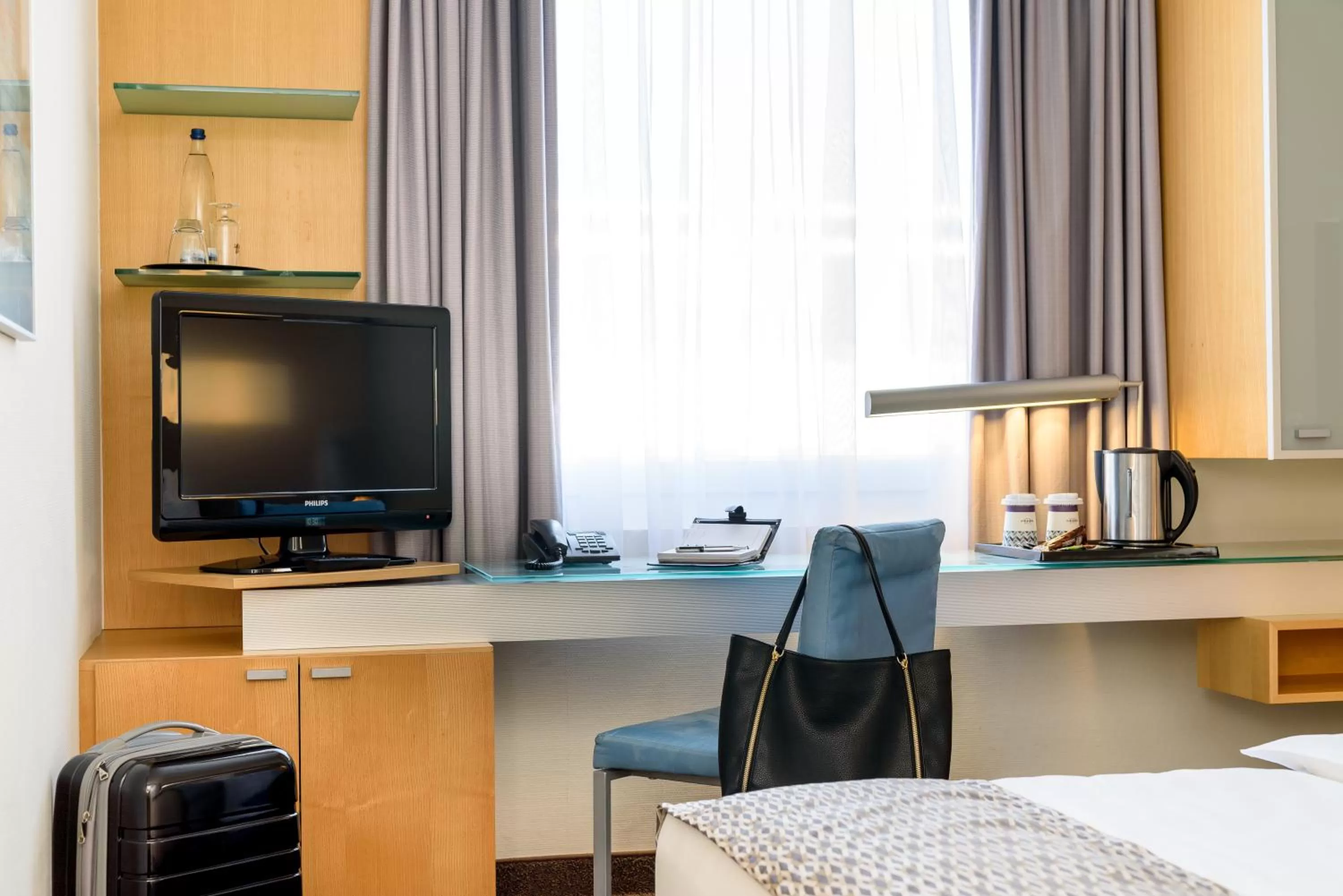 TV and multimedia in Mercure Hotel Düsseldorf City Nord