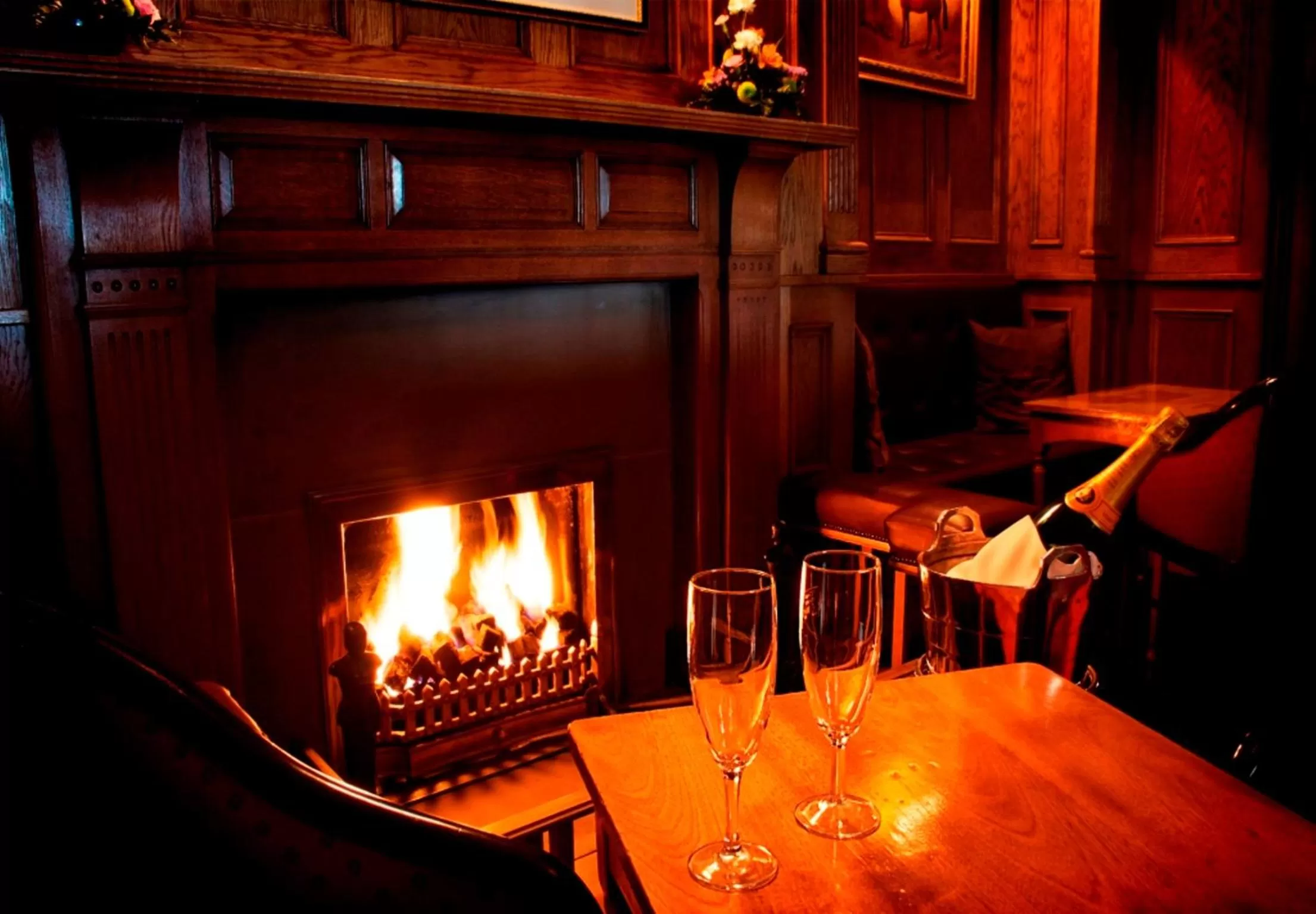 Communal lounge/ TV room in Willington Hall Hotel