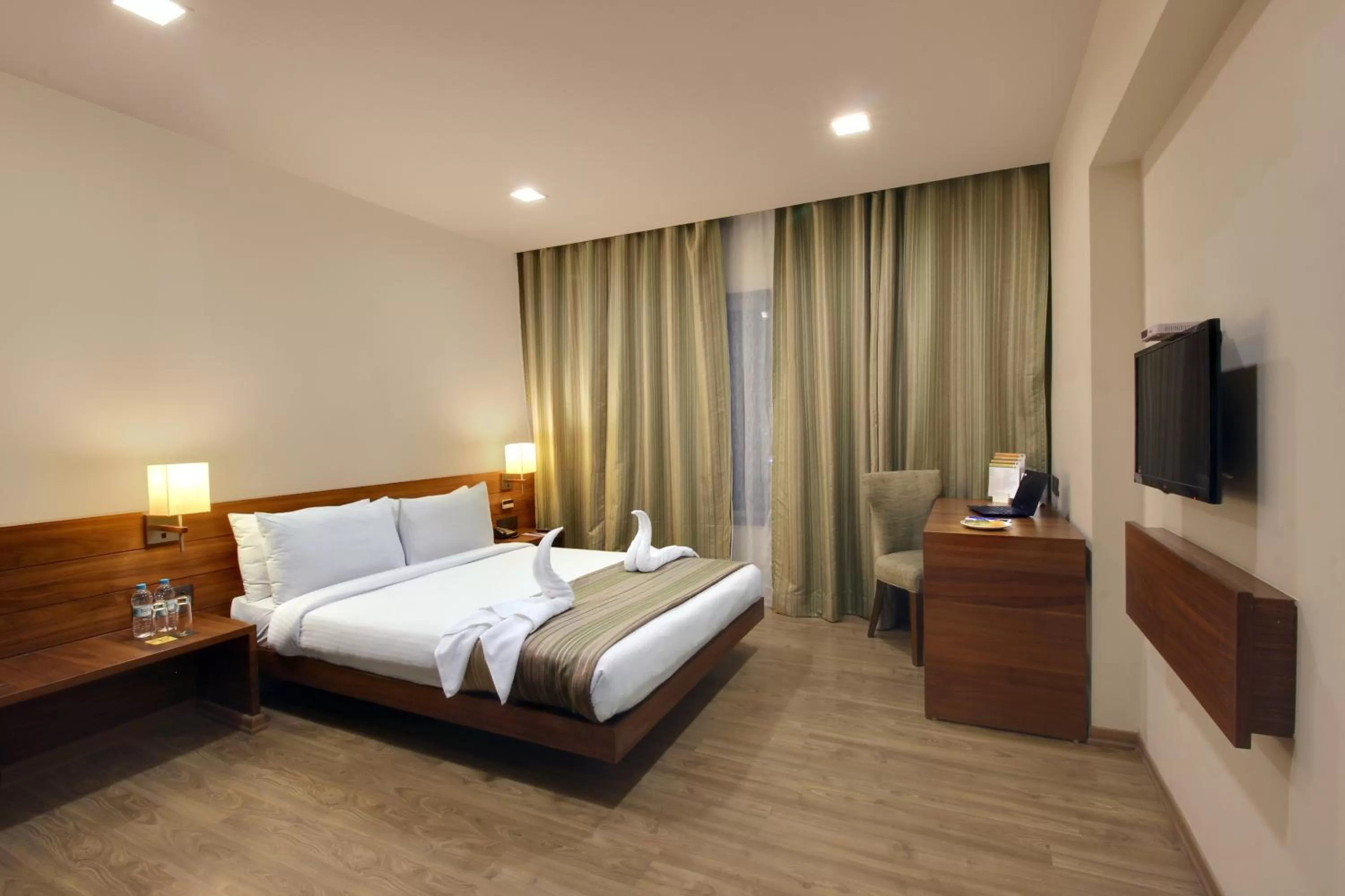 Bed in Temple Tree Hotel Shirdi, a member of Radisson Individuals