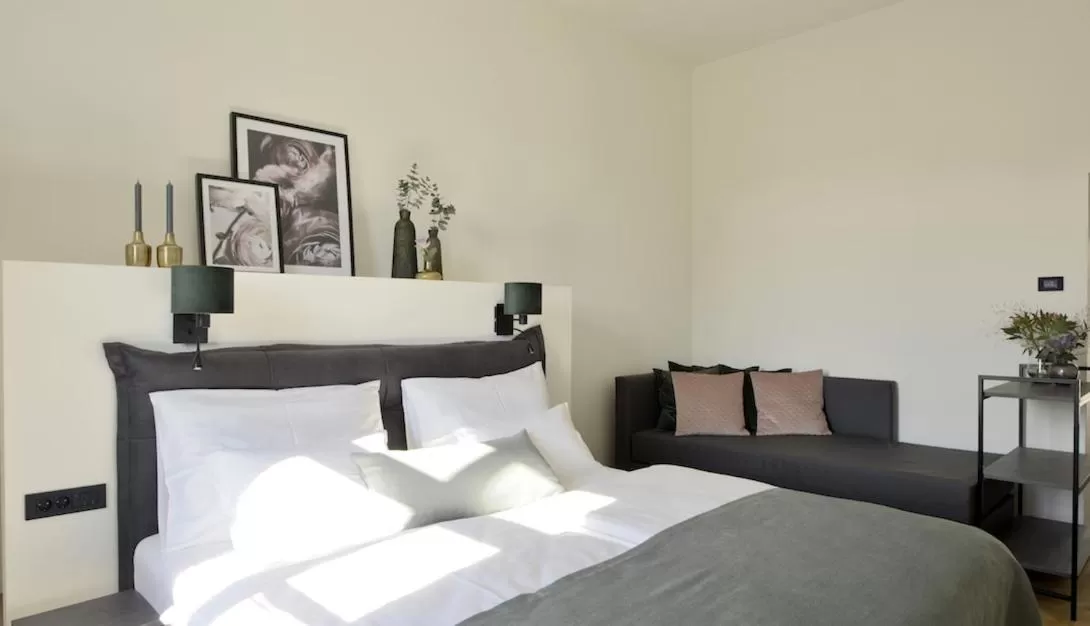 Bed in Hotel Maribor & Garden Rooms