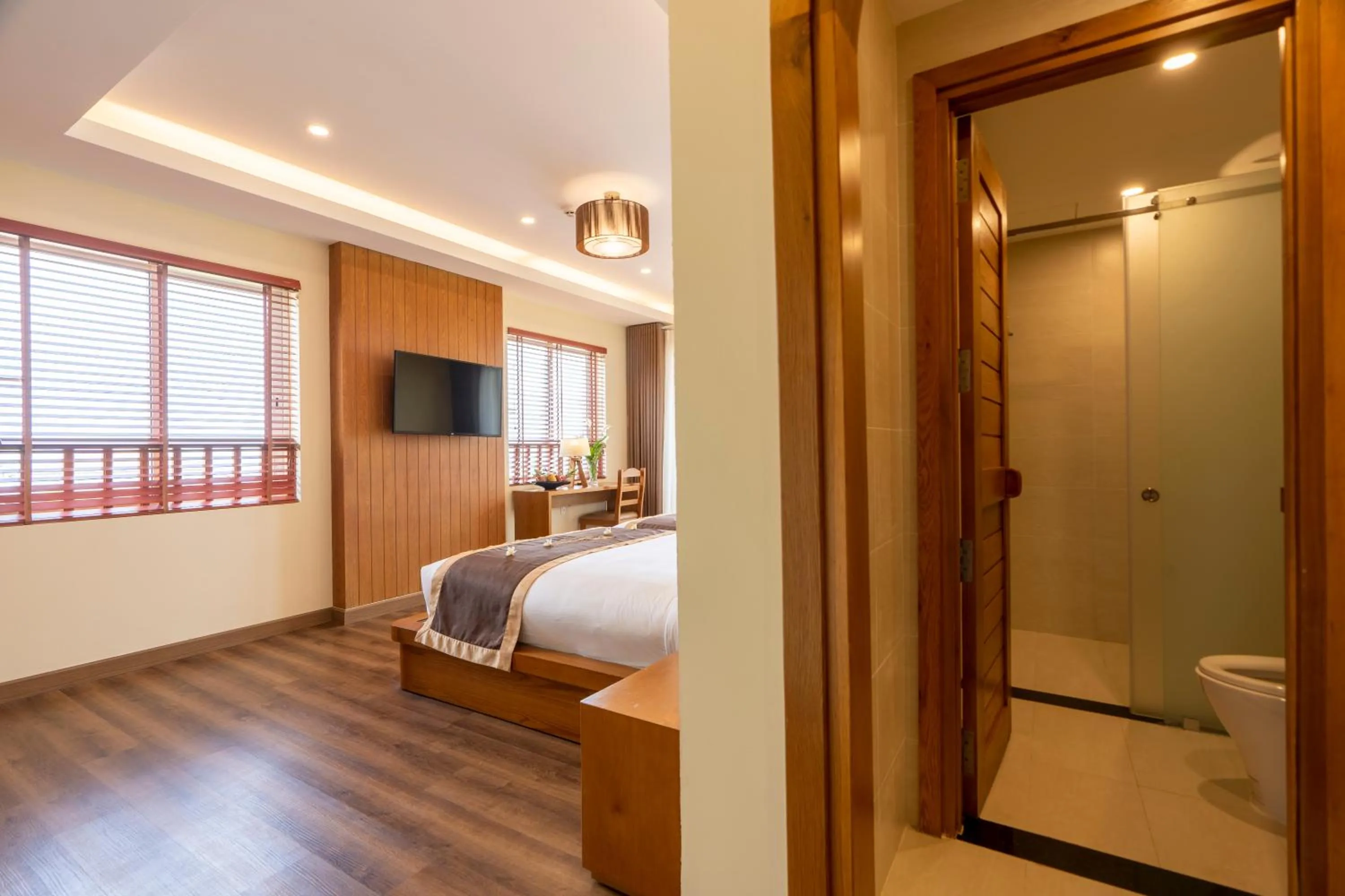 Shower, Bed in Aroma Beach Resort and Spa