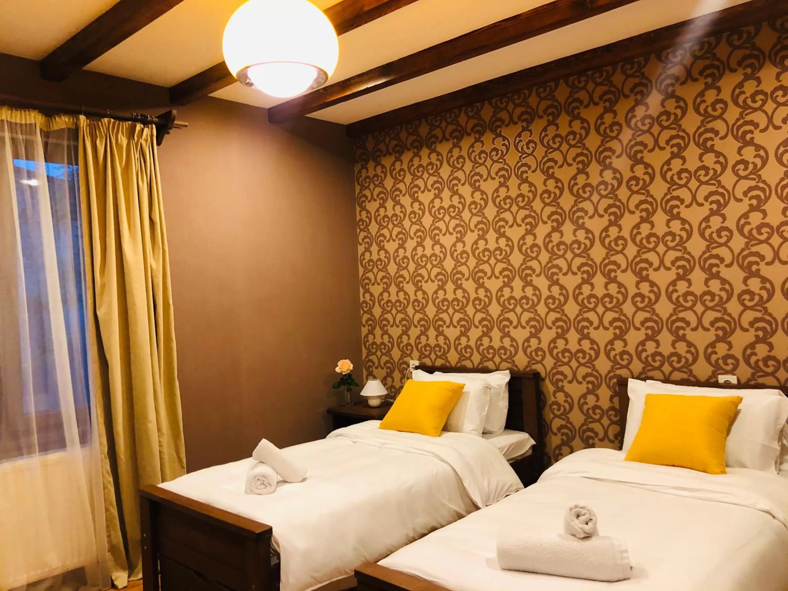 Bed in Borjomi Yellow Hotel