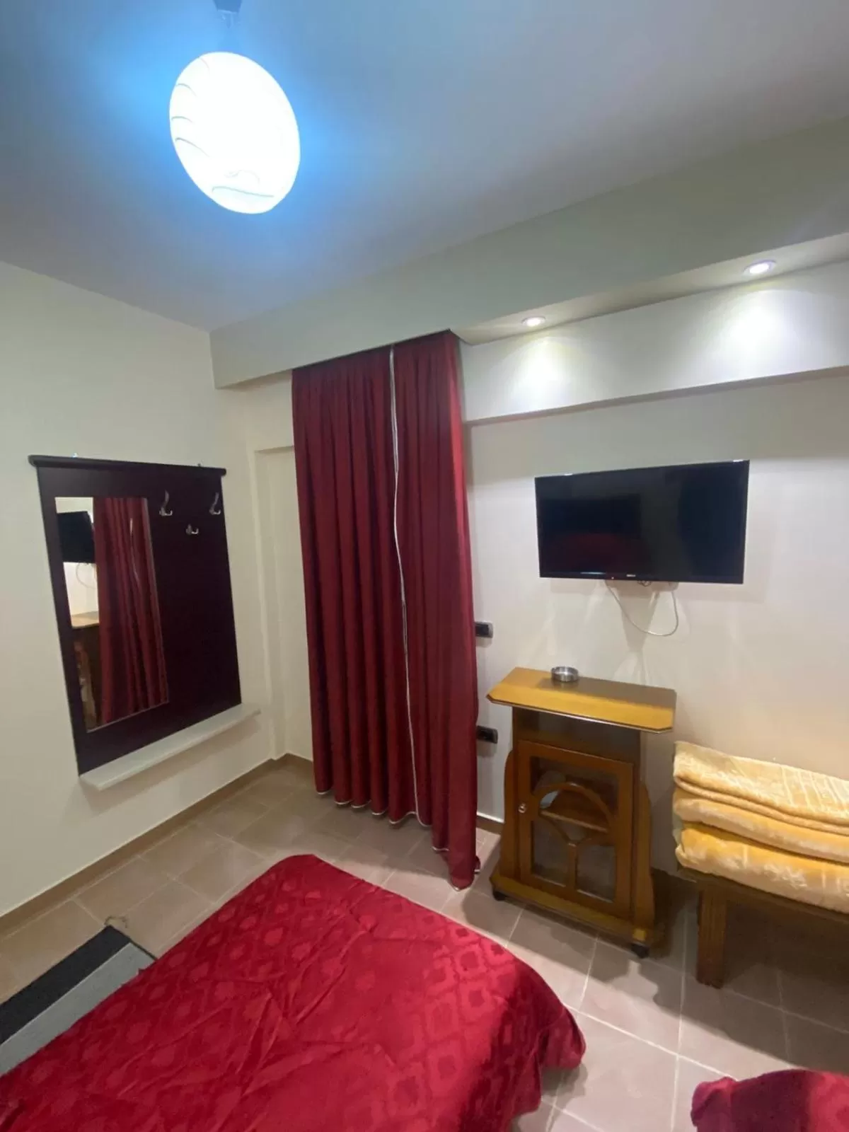 Communal lounge/ TV room, TV/Entertainment Center in Hotel Ago