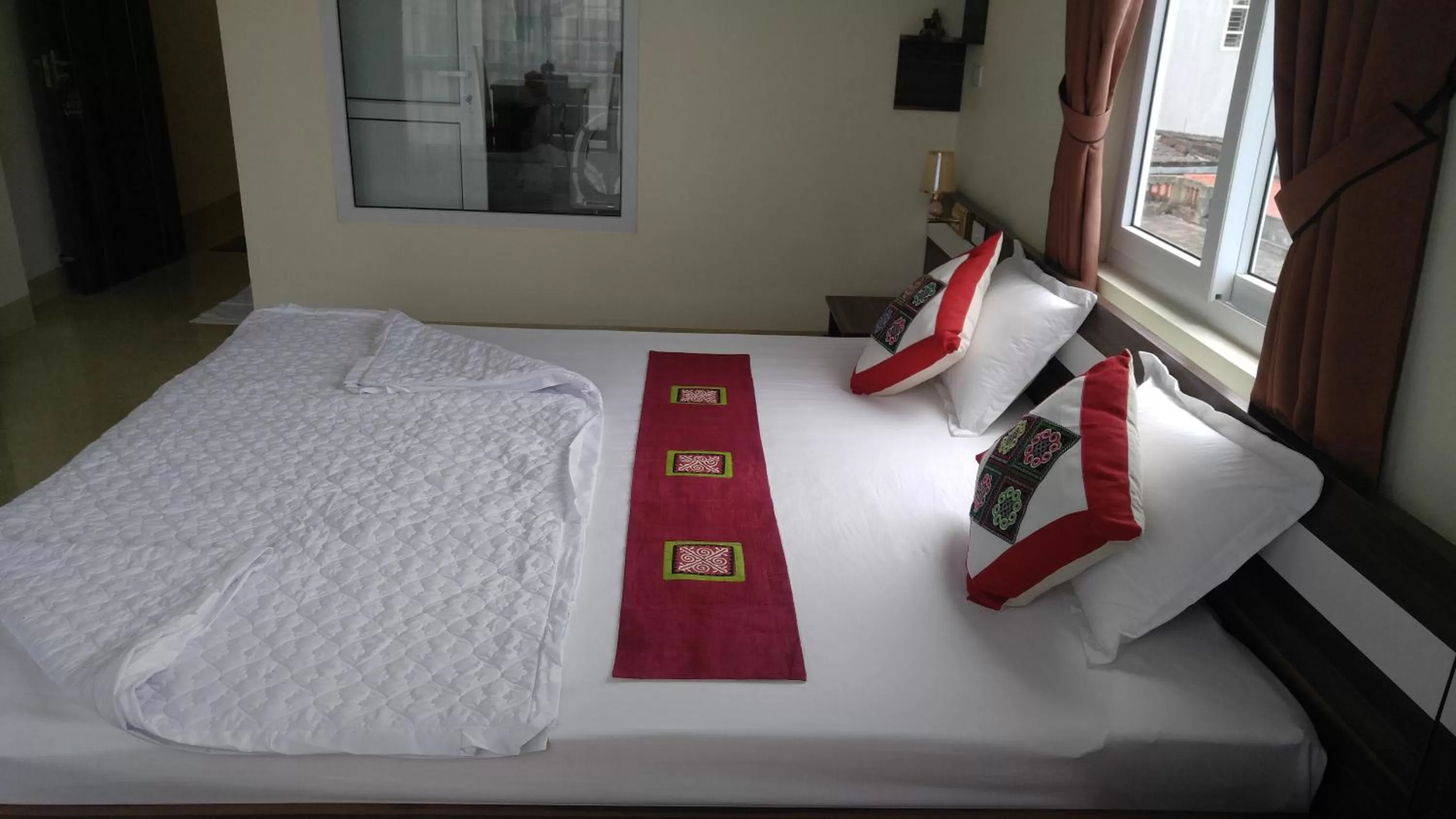 Bed in Friendly Home Hotel