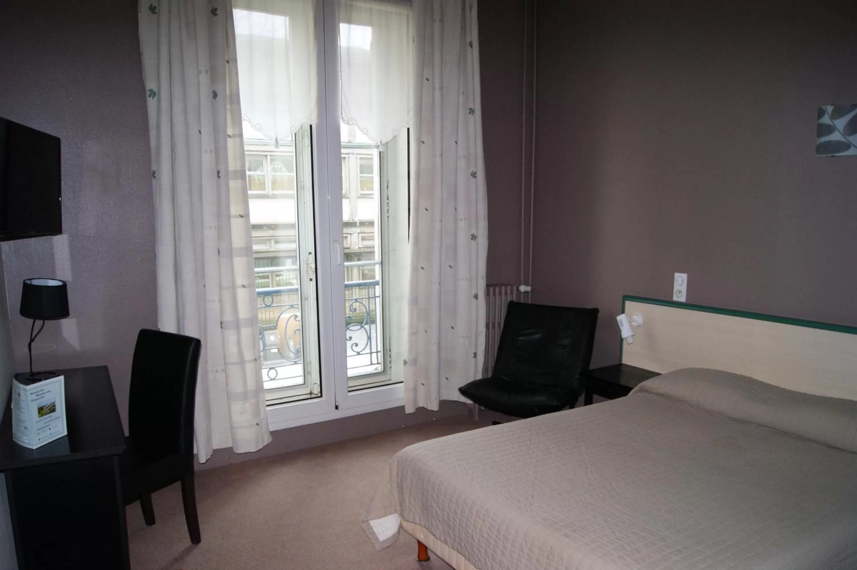 Bedroom in Hôtel Central