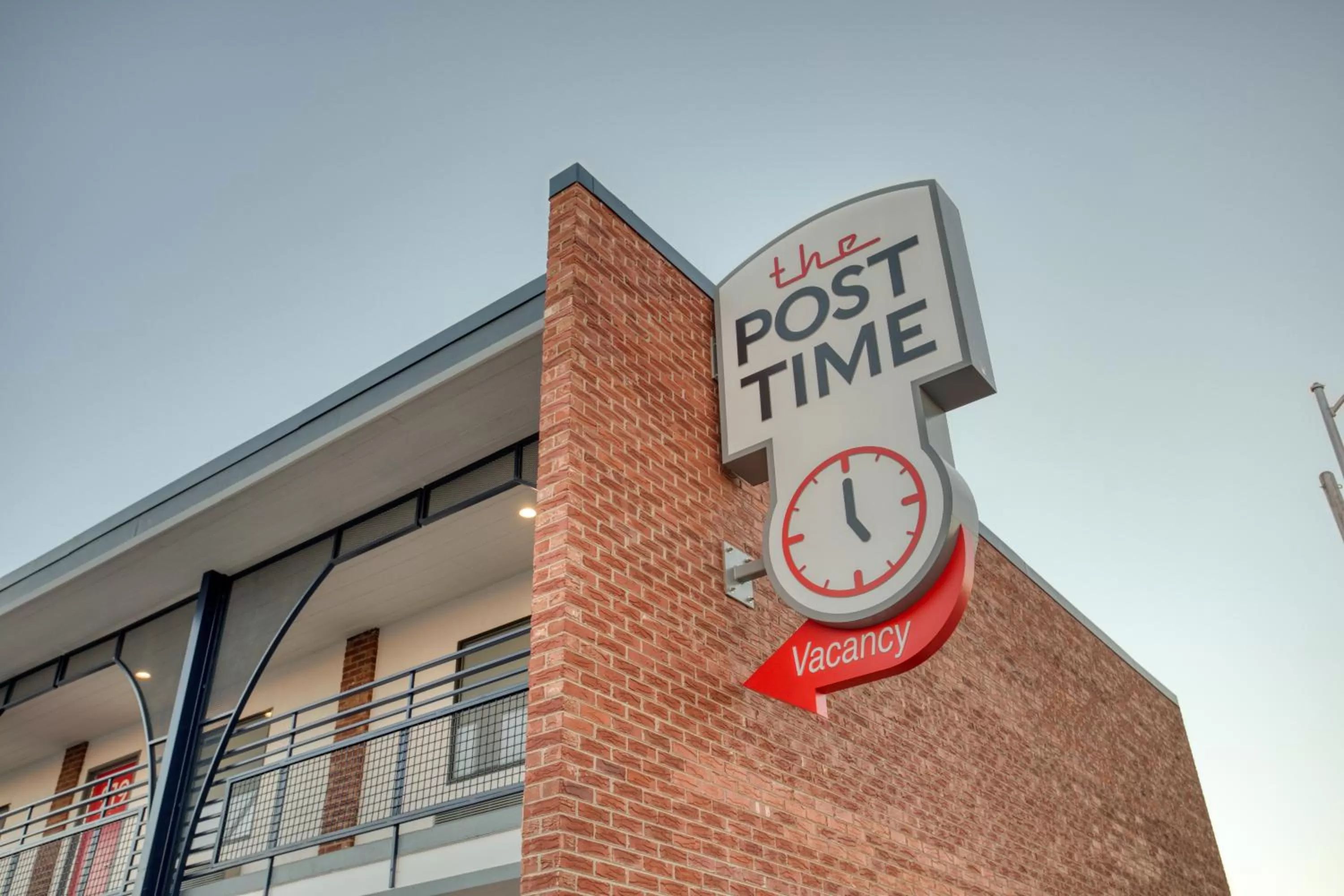 Property logo or sign in Post Time Inn